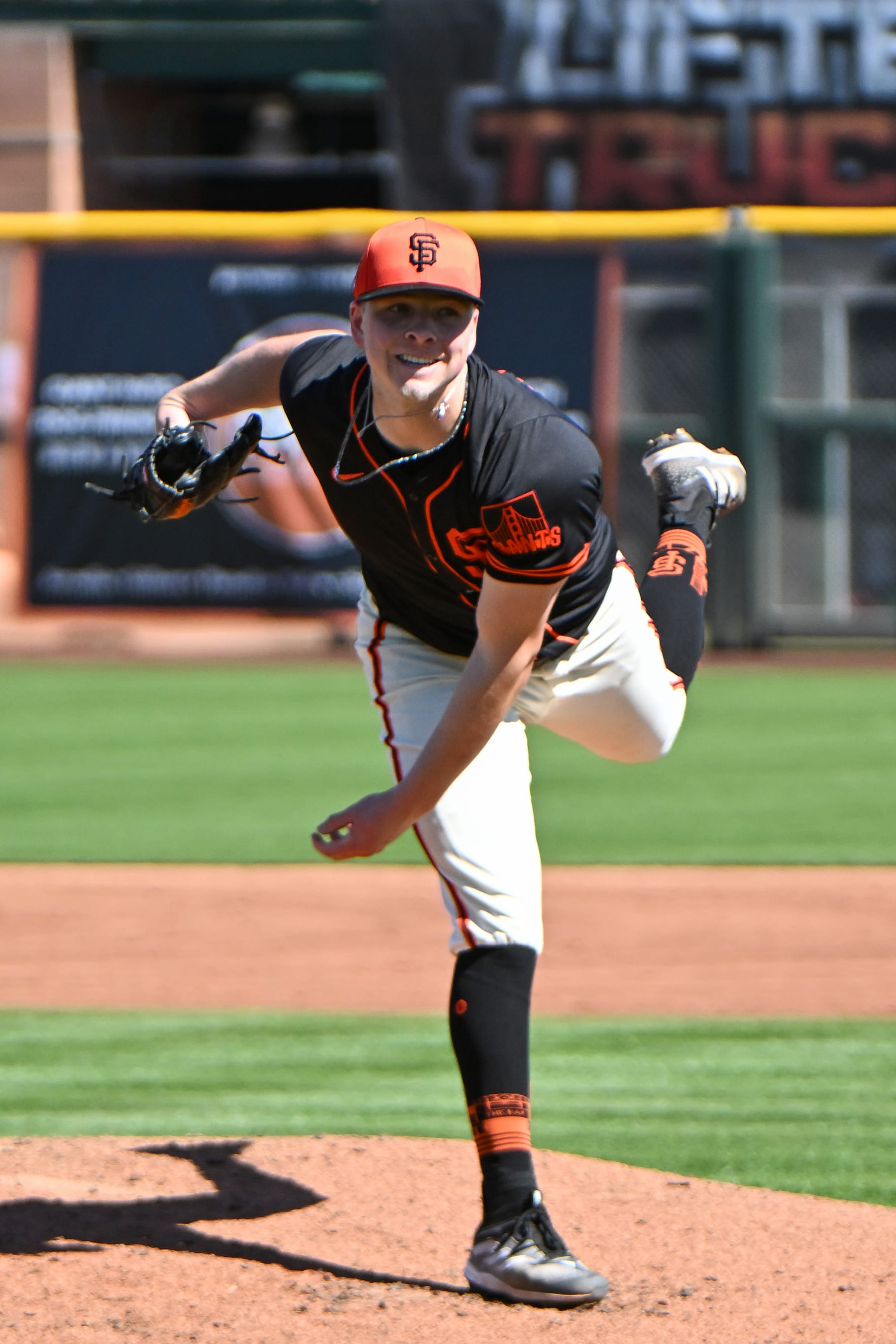 SCOTTSDALE, ARIZONA - MARCH 01, 2024: Kyle Harrison #45 of the San Francisco Giants throws a pitch during the second inning of a spring training game against the Texas Rangers at Scottsdale Stadium on March 1, 2024 in Scottsdale, Arizona. (Photo by David Durochik/Diamond Images via Getty Images)