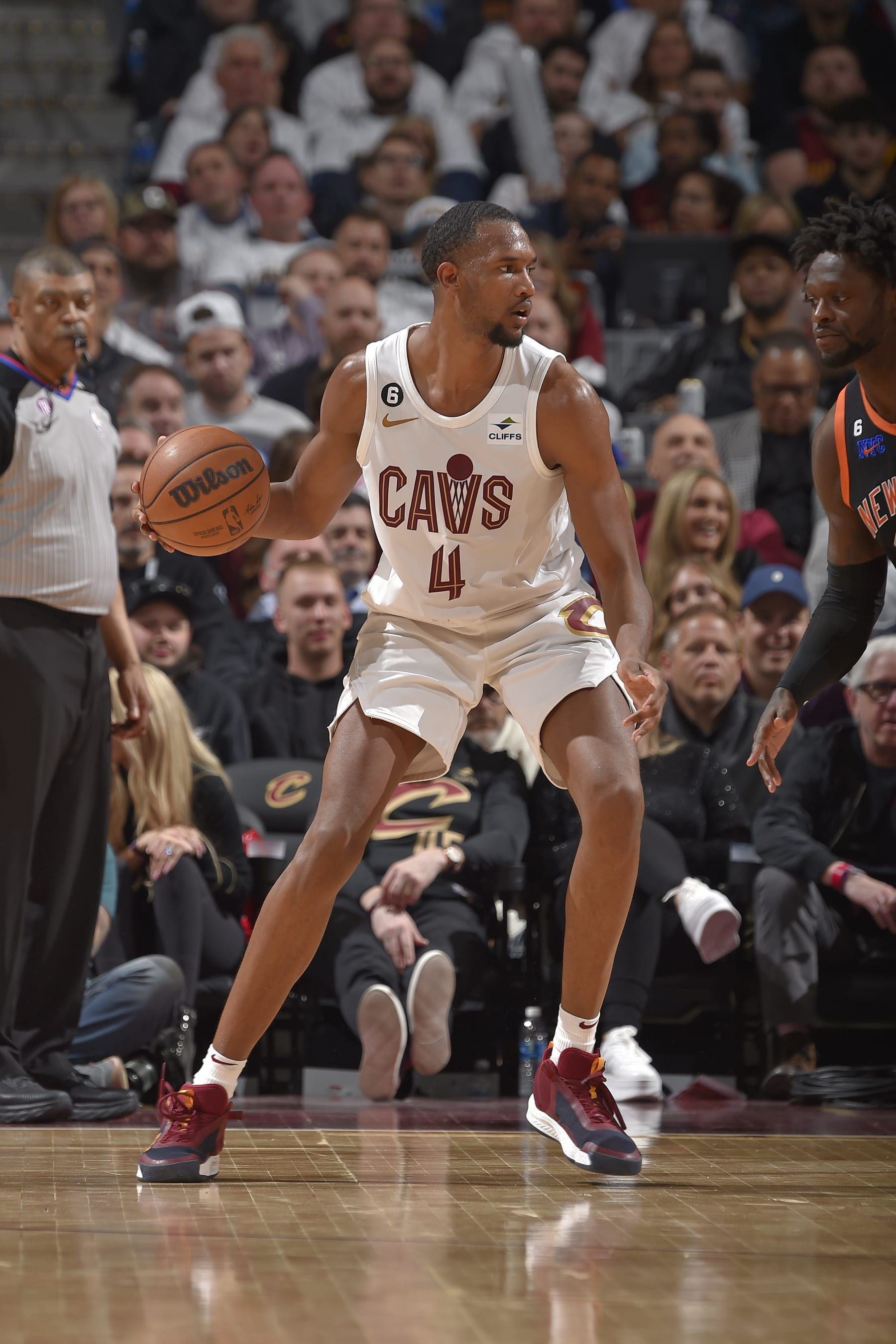 CLEVELAND, OH - APRIL 18: Evan Mobley #4 of the Cleveland Cavaliers dribbles the ball during the game against the New York Knicks on April 18, 2023 at Rocket Mortgage FieldHouse in Cleveland, Ohio. NOTE TO USER: User expressly acknowledges and agrees that, by downloading and/or using this Photograph, user is consenting to the terms and conditions of the Getty Images License Agreement. Mandatory Copyright Notice: Copyright 2023 NBAE (Photo by David Liam Kyle/NBAE via Getty Images)
