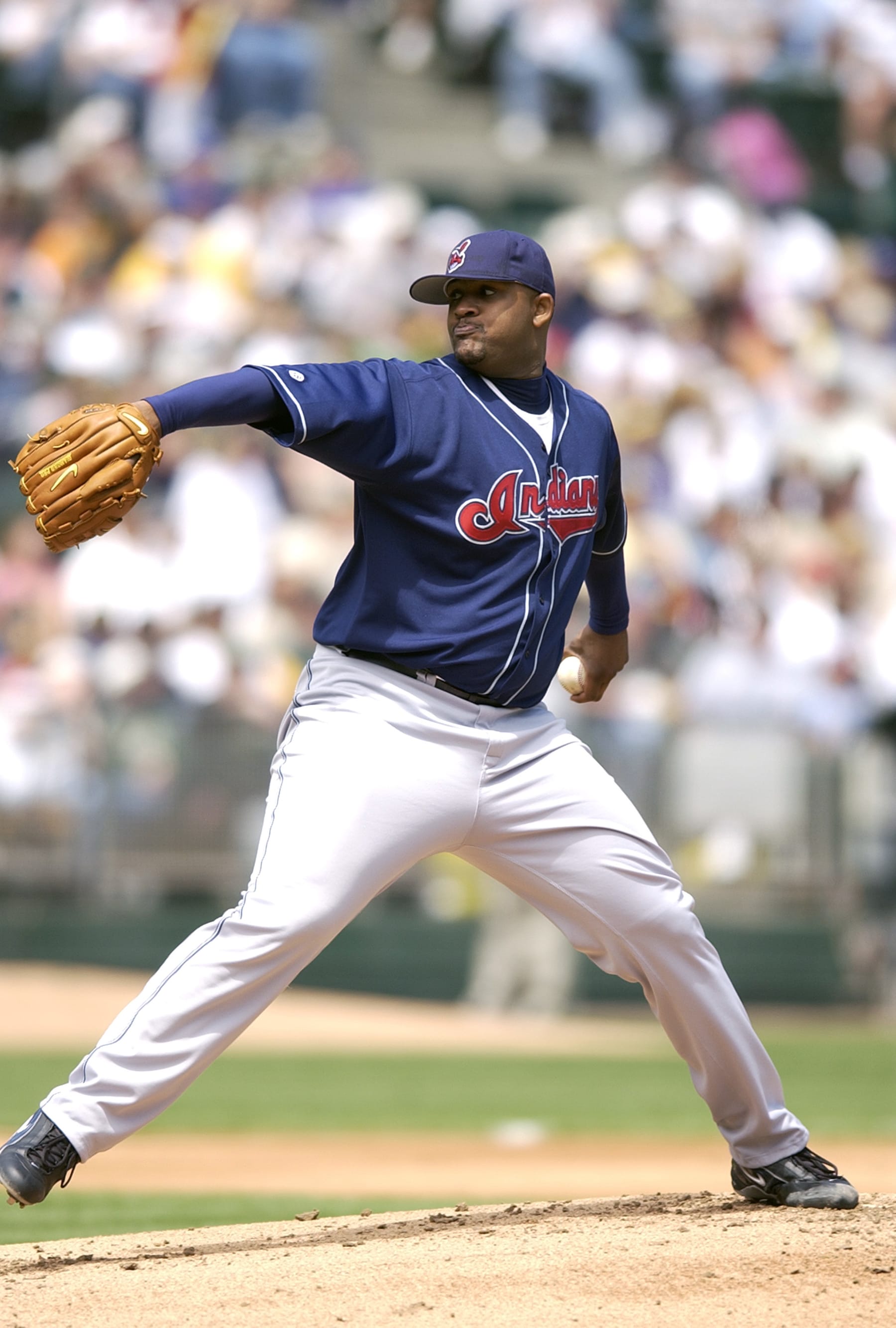 OAKLAND, CA - APRIL 28:  C.C. Sabathia #52 of the Cleveland Indians pitches against the Oakland Athletics during an Major League Baseball game April 28, 2003 at the Oakland-Alameda County Coliseum in Oakland, California.  Sabathia played for the Indians from 2001-2008. (Photo by Focus on Sport/Getty Images)