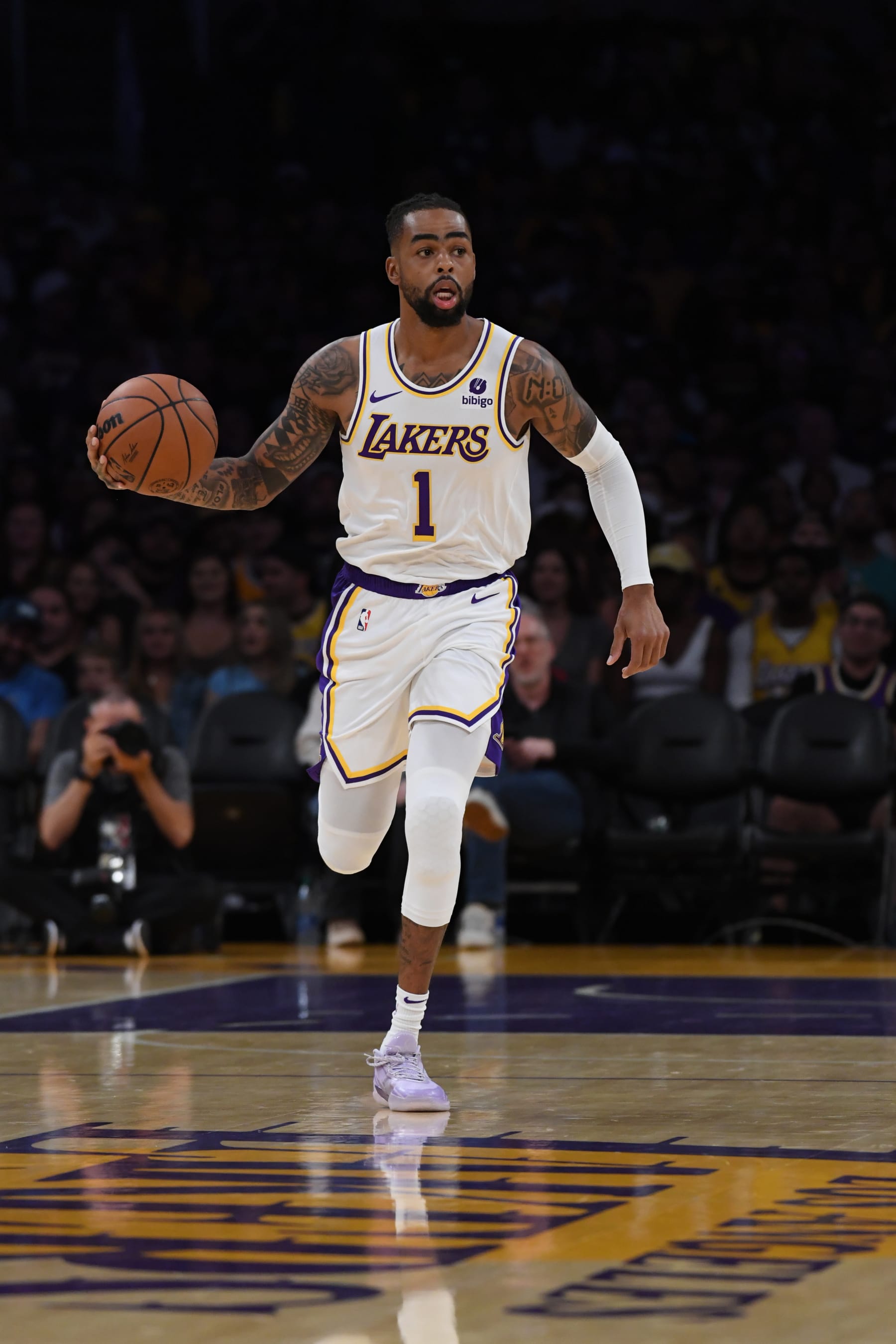 LOS ANGELES, CA - OCTOBER 15: D'Angelo Russell #1 of the Los Angeles Lakers dribbles the ball during the preseason game on October 15, 2023 at Crypto.Com Arena in Los Angeles, California. NOTE TO USER: User expressly acknowledges and agrees that, by downloading and/or using this Photograph, user is consenting to the terms and conditions of the Getty Images License Agreement. Mandatory Copyright Notice: Copyright 2023 NBAE (Photo by Juan Ocampo/NBAE via Getty Images)