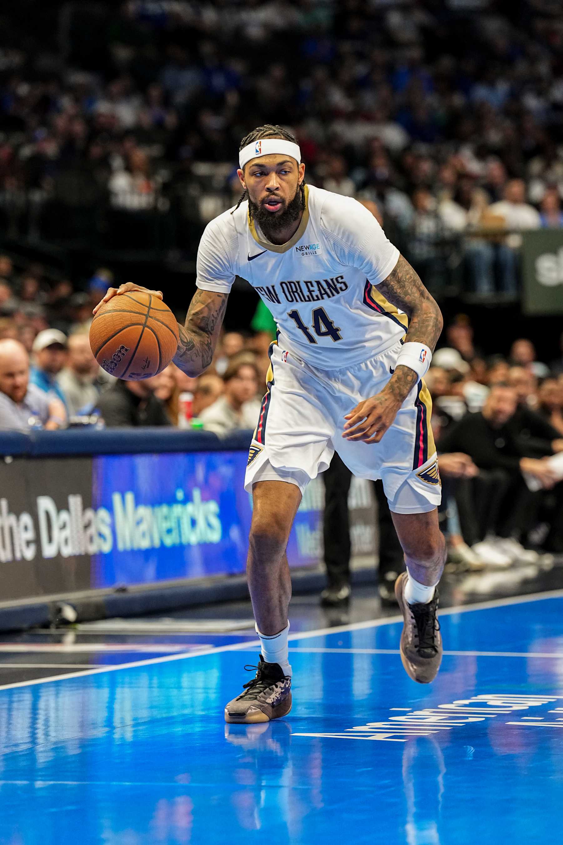 DALLAS, TX - November 19: Brandon Ingram #14 of the New Orleans Pelicans dribbles the ball during the NBA Cup game against the Dallas Mavericks on November 19, 2024 at American Airlines Center in Dallas, Texas. NOTE TO USER: User expressly acknowledges and agrees that, by downloading and or using this photograph, User is consenting to the terms and conditions of the Getty Images License Agreement. Mandatory Copyright Notice: Copyright 2024 NBAE (Photo by Glenn James/NBAE via Getty Images)