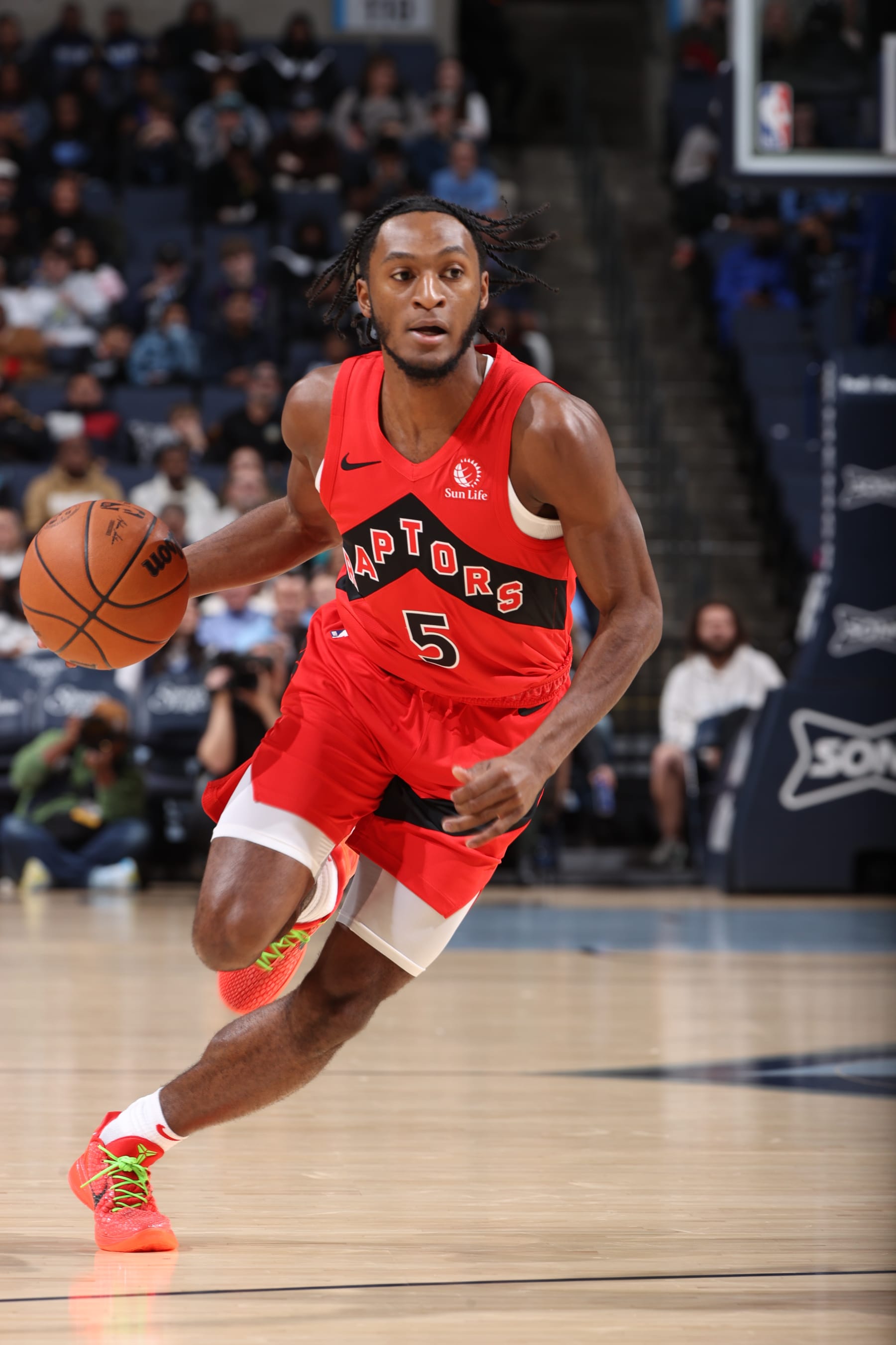 MEMPHIS, TN - JANUARY 3:  Immanuel Quickley #5 of the Toronto Raptors handles the ball during the game  on January 3, 2024 at FedExForum in Memphis, Tennessee. NOTE TO USER: User expressly acknowledges and agrees that, by downloading and or using this photograph, User is consenting to the terms and conditions of the Getty Images License Agreement. Mandatory Copyright Notice: Copyright 2024 NBAE (Photo by Joe Murphy/NBAE via Getty Images)