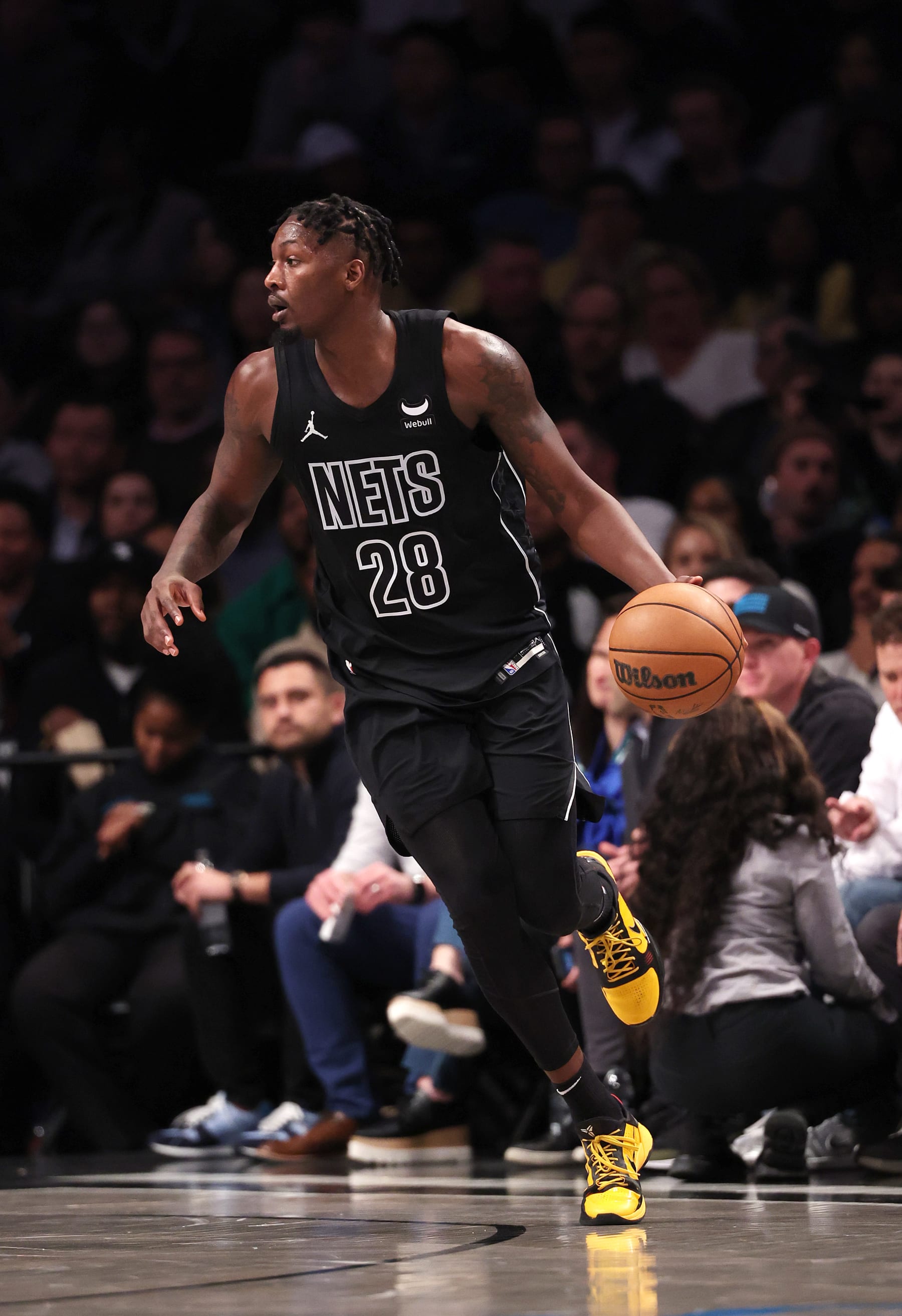 NEW YORK, NEW YORK - JANUARY 25:  Dorian Finney-Smith #28 of the Brooklyn Nets in action against the Minnesota Timberwolves during their game at Barclays Center on January 25, 2024 in New York City.  User expressly acknowledges and agrees that, by downloading and or using this photograph, User is consenting to the terms and conditions of the Getty Images License Agreement.  (Photo by Al Bello/Getty Images)
