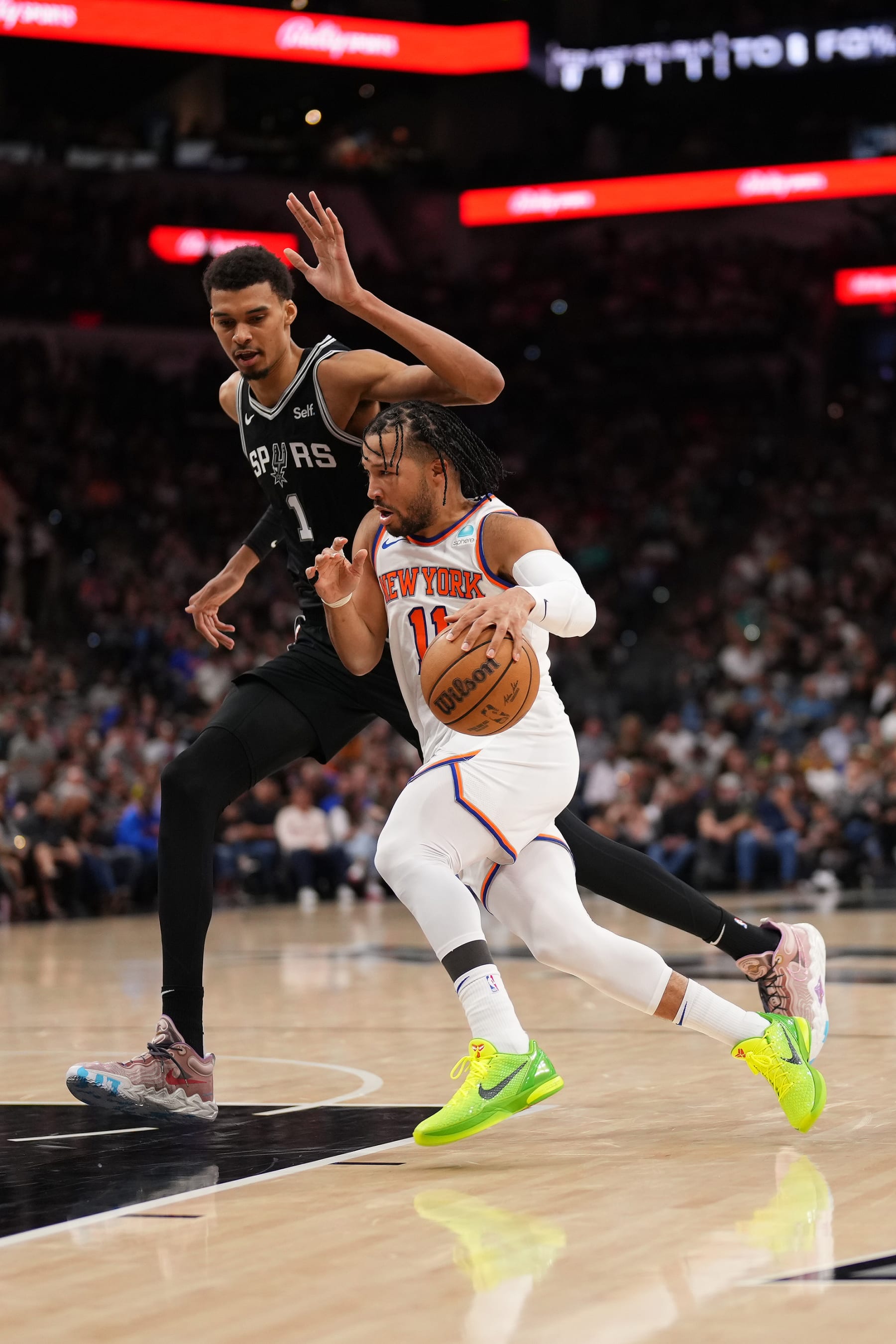 SAN ANTONIO, TX - MARCH 29: Victor Wembanyama #1 of the San Antonio Spurs plays defense against Jalen Brunson #11 of the New York Knicks on March 29, 2024 at the Frost Bank Center in San Antonio, Texas. NOTE TO USER: User expressly acknowledges and agrees that, by downloading and or using this photograph, user is consenting to the terms and conditions of the Getty Images License Agreement. Mandatory Copyright Notice: Copyright 2024 NBAE (Photos by Darren Carroll/NBAE via Getty Images)