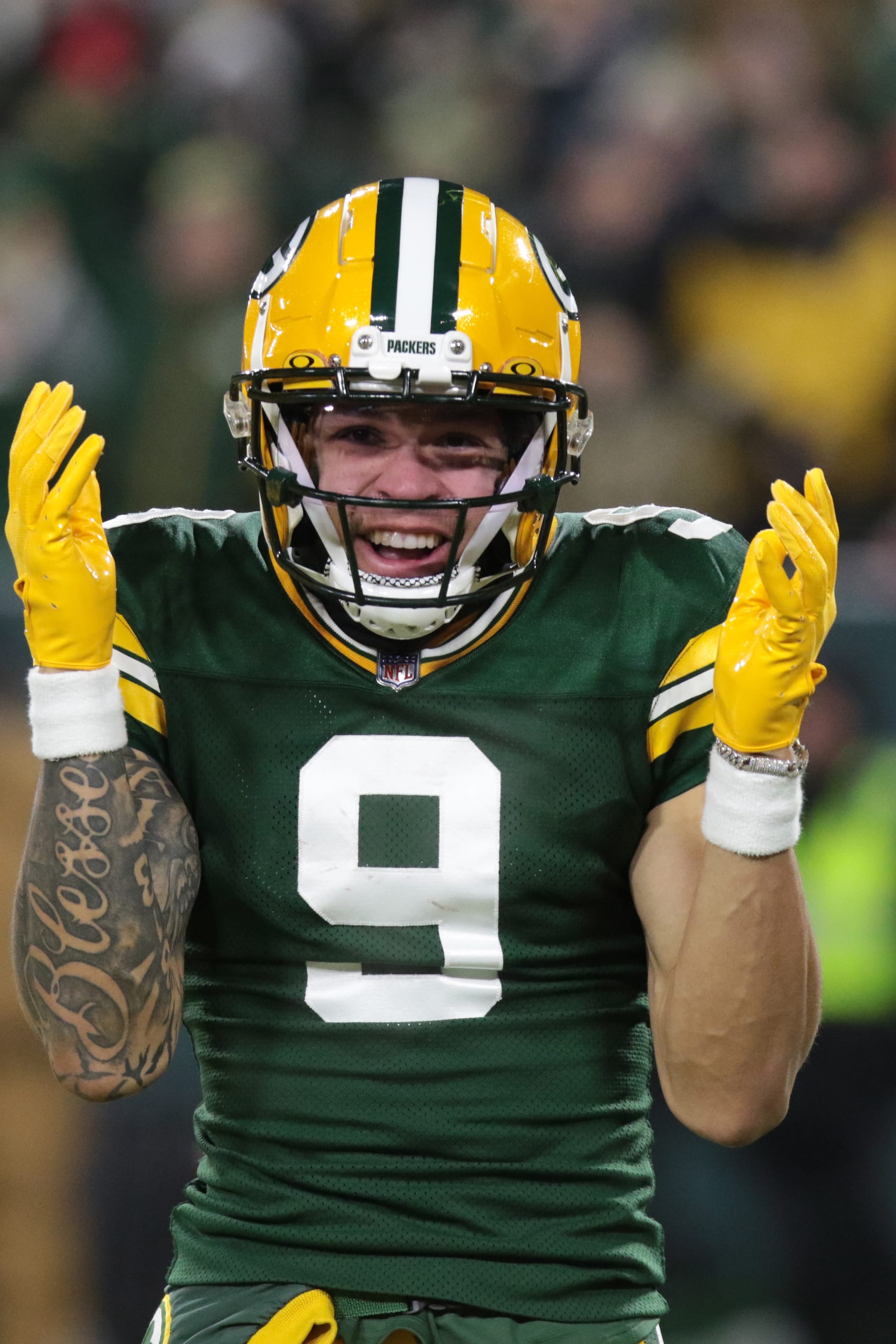 GREEN BAY, WI - DECEMBER 03: Green Bay Packers wide receiver Christian Watson (9) celebrates a touchdown during a game between the Green Bay Packers and the Kansas City Chiefs at Lambeau Field on December 3, 2023 in Green Bay, WI. (Photo by Larry Radloff/Icon Sportswire via Getty Images)
