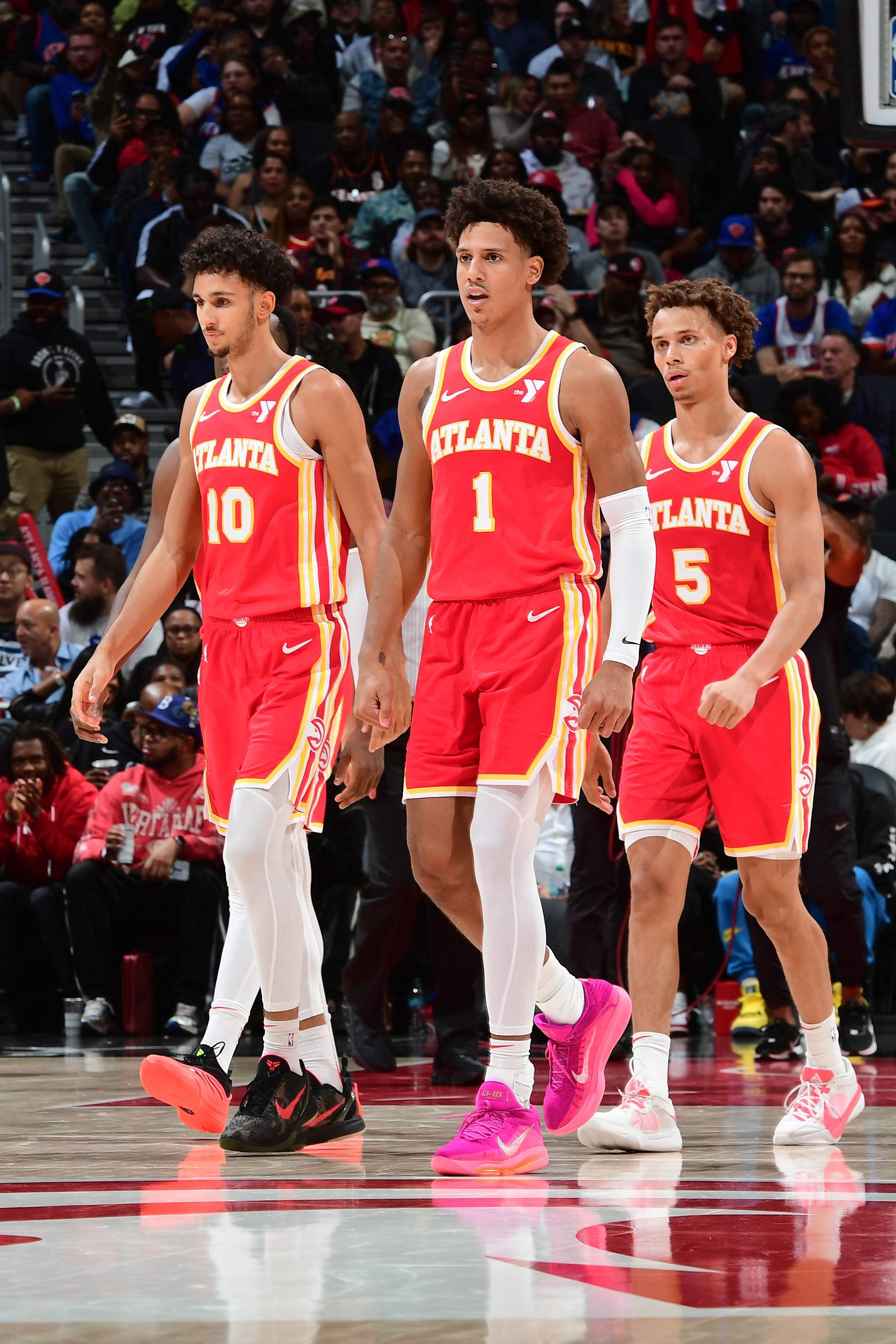 ATLANTA, GA - NOVEMBER 6: Jalen Johnson #1, Zaccharie Risacher #10 and Dyson Daniels #5 of the Atlanta Hawks look on during the game against the New York Knicks during a regular season game on November 6, 2024 at State Farm Arena in Atlanta, Georgia.  NOTE TO USER: User expressly acknowledges and agrees that, by downloading and/or using this Photograph, user is consenting to the terms and conditions of the Getty Images License Agreement. Mandatory Copyright Notice: Copyright 2024 NBAE (Photo by Scott Cunningham/NBAE via Getty Images)