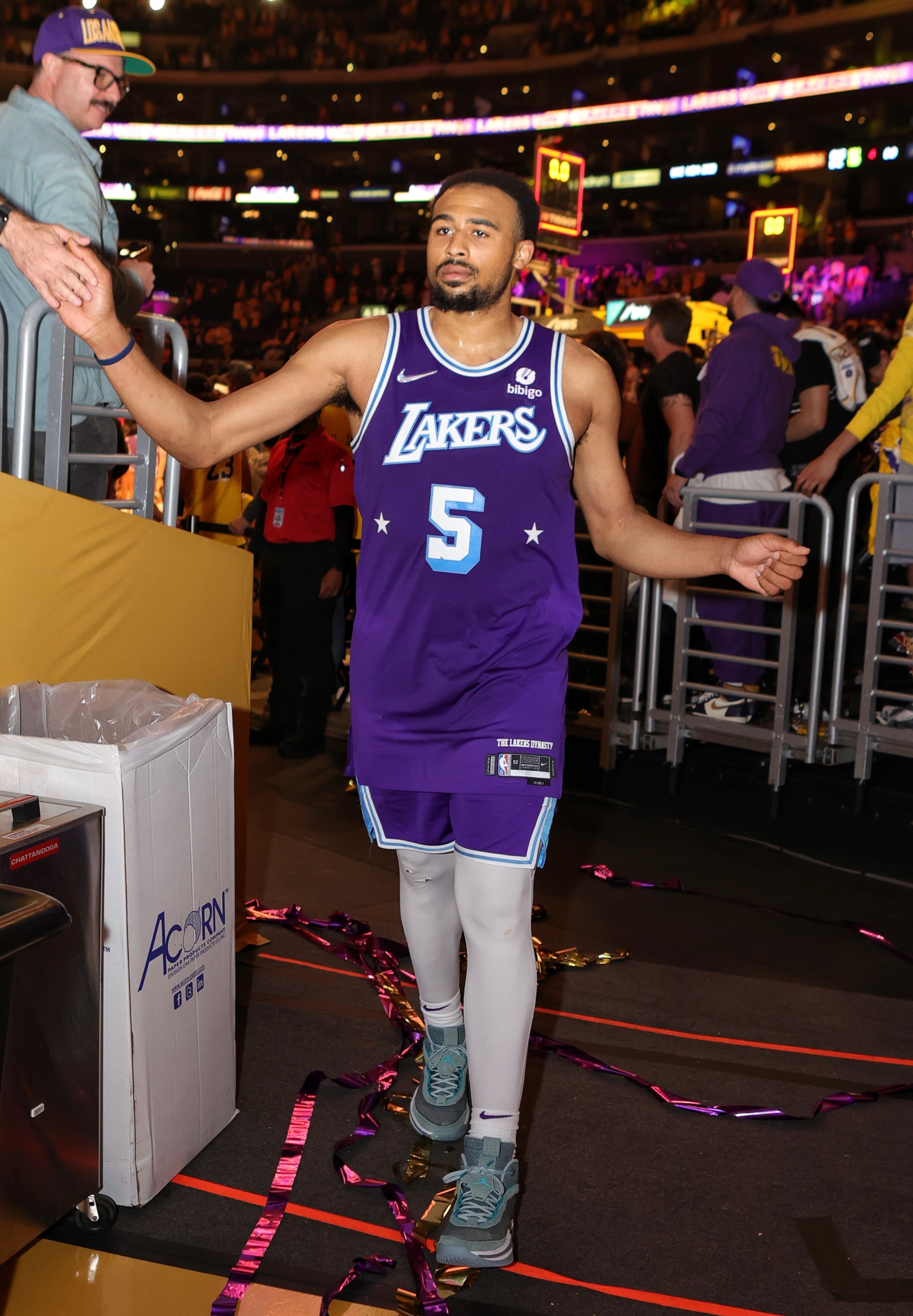 LOS ANGELES, CA - APRIL 8: Talen Horton-Tucker #5 of the Los Angeles Lakers leaves the arena after the game against the Oklahoma City Thunder of the Oklahoma City Thunder against the Los Angeles Lakers on April 8, 2022 at Cryto.com Arena in Los Angeles, California. NOTE TO USER: User expressly acknowledges and agrees that, by downloading and/or using this photograph, user is consenting to the terms and conditions of the Getty Images License Agreement.  Mandatory Copyright Notice: Copyright 2022 NBAE (Photo by Jim Poorten/NBAE via Getty Images)