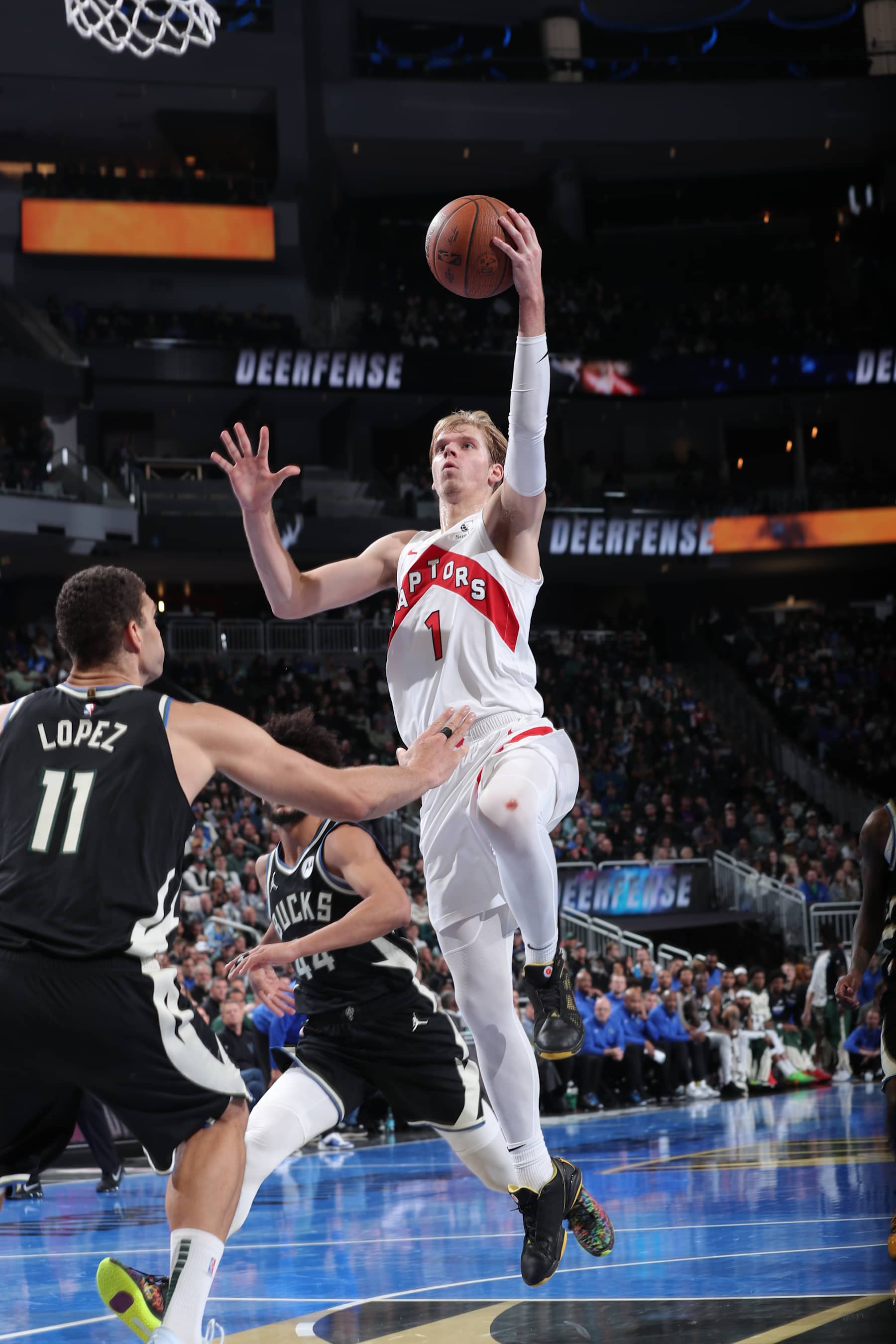MILWAUKEE, WI - NOVEMBER 12: Gradey Dick #1 of the Toronto Raptors shoots the ball during the game against the Milwaukee Bucks  during the Emirates NBA Cup game on November 12, 2024 at Fiserv Forum Center in Milwaukee, Wisconsin. NOTE TO USER: User expressly acknowledges and agrees that, by downloading and or using this Photograph, user is consenting to the terms and conditions of the Getty Images License Agreement. Mandatory Copyright Notice: Copyright 2024 NBAE (Photo by Gary Dineen/NBAE via Getty Images).