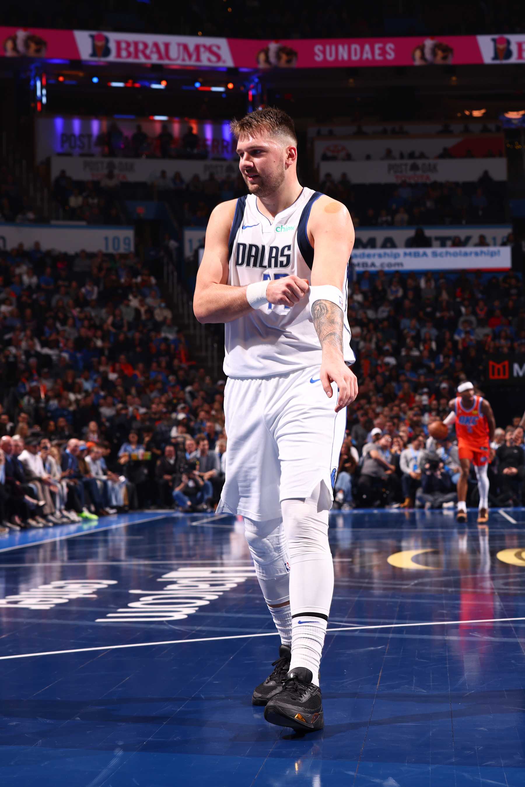 OKLAHOMA CITY, OK - DECEMBER 10: Luka Doncic #77 of the Dallas Mavericks looks on during the game against the Oklahoma City Thunder during the Emirates NBA Cup Quarterfinals on December 10, 2024 at Paycom Center in Oklahoma City, Oklahoma. NOTE TO USER: User expressly acknowledges and agrees that, by downloading and or using this photograph, User is consenting to the terms and conditions of the Getty Images License Agreement. Mandatory Copyright Notice: Copyright 2024 NBAE (Photo by Zach Beeker/NBAE via Getty Images)