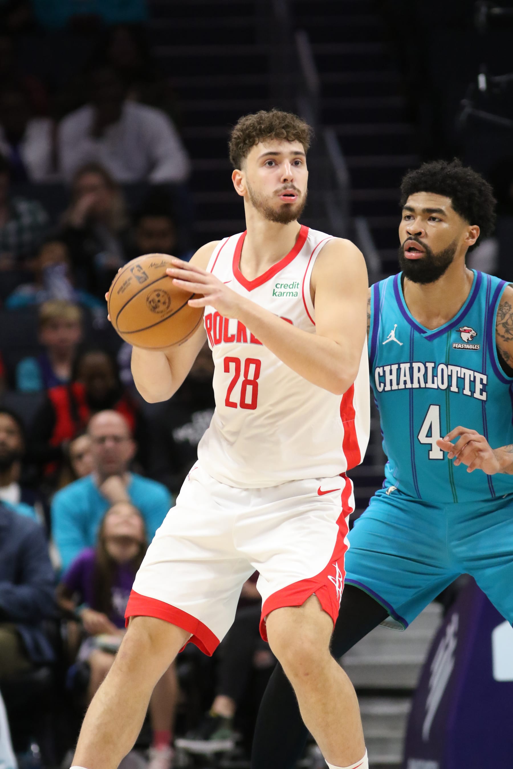 CHARLOTTE, NC - JANUARY 26:  Alperen Sengun #28 of the Houston Rockets handles the ball during the game against the Charlotte Hornets on January 26, 2024 at Spectrum Center in Charlotte, North Carolina. NOTE TO USER: User expressly acknowledges and agrees that, by downloading and or using this photograph, User is consenting to the terms and conditions of the Getty Images License Agreement.  Mandatory Copyright Notice:  Copyright 2024 NBAE (Photo by Brock Williams-Smith/NBAE via Getty Images)