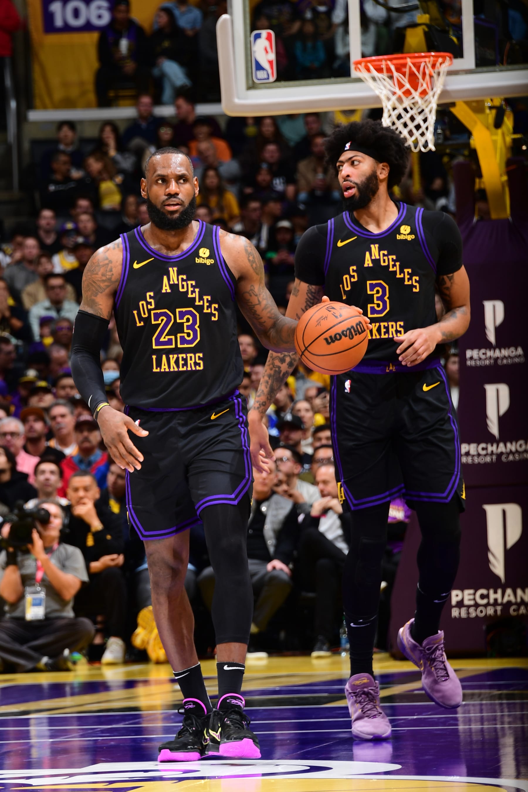 LOS ANGELES, CA - NOVEMBER 14: LeBron James #23 of the Los Angeles Lakers handles the ball next to Anthony Davis #3 during the game against the Memphis Grizzlies during the In-Season Tournament on November 14, 2023 at Crypto.Com Arena in Los Angeles, California. NOTE TO USER: User expressly acknowledges and agrees that, by downloading and/or using this Photograph, user is consenting to the terms and conditions of the Getty Images License Agreement. Mandatory Copyright Notice: Copyright 2023 NBAE (Photo by Adam Pantozzi/NBAE via Getty Images)