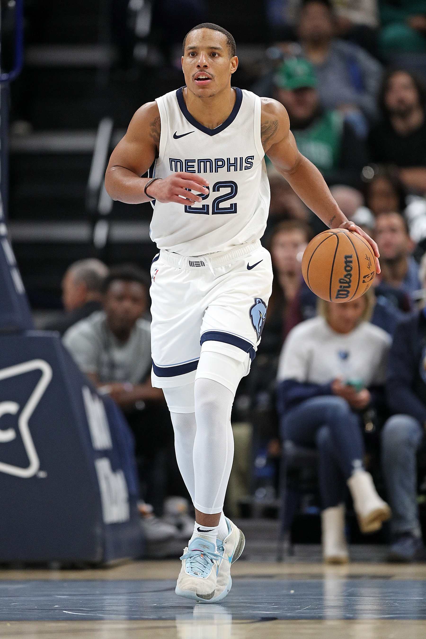 MEMPHIS, TENNESSEE - NOVEMBER 19: Desmond Bane #22 of the Memphis Grizzlies brings the ball up court during the second half against the Boston Celtics at FedExForum on November 19, 2023 in Memphis, Tennessee. NOTE TO USER: User expressly acknowledges and agrees that, by downloading and or using this photograph, User is consenting to the terms and conditions of the Getty Images License Agreement.  (Photo by Justin Ford/Getty Images)
