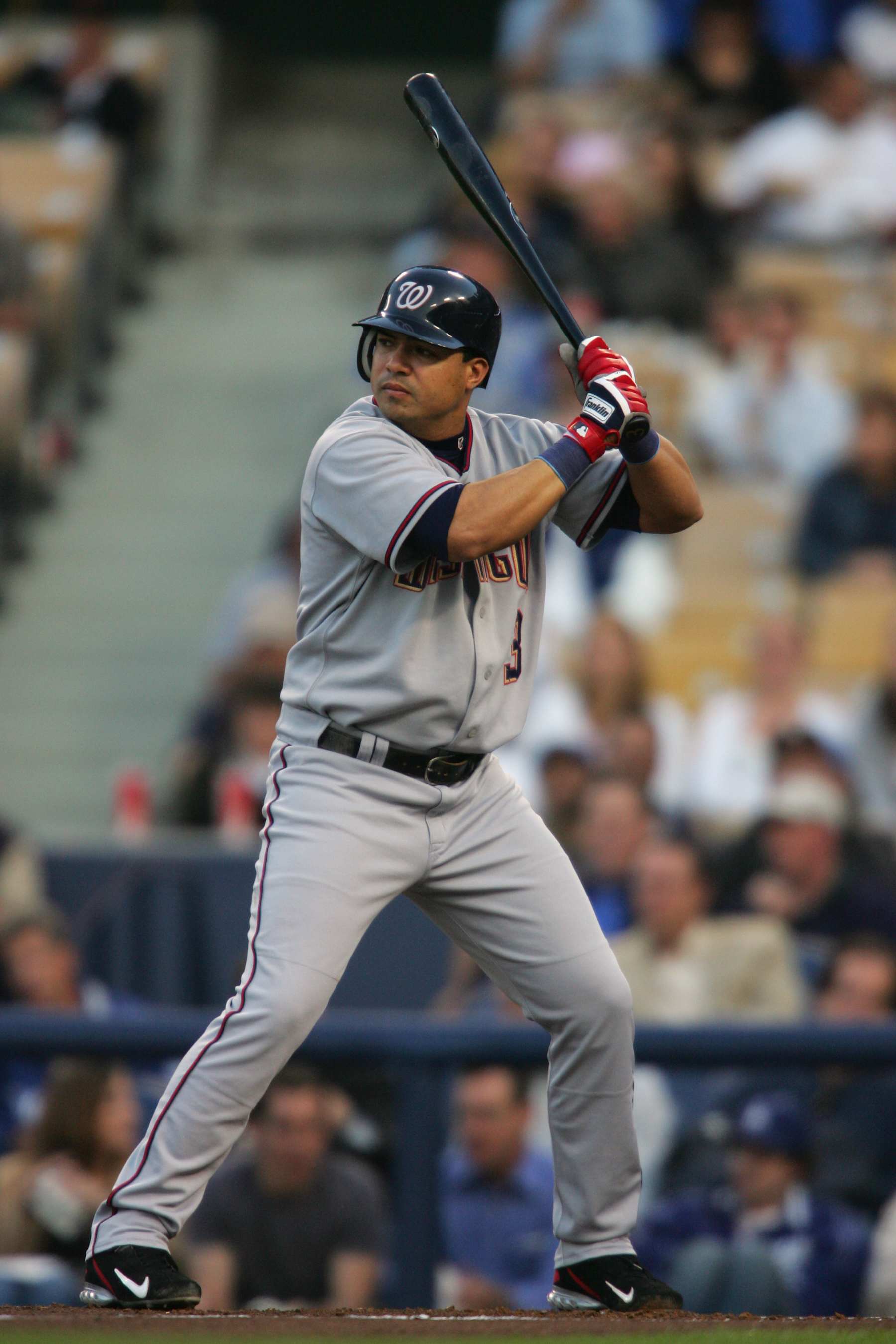 LOS ANGELES  - MAY 3:  Infielder Jose Vidro #3 of the Washington Nationals waits for a Los Angeles Dodgers pitch during the game on May 3, 2005 at Dodger Stadium in Los Angeles, California.  The Dodgers defeated the Nationals 4-2.  (Photo by Nick Laham/Getty Images).