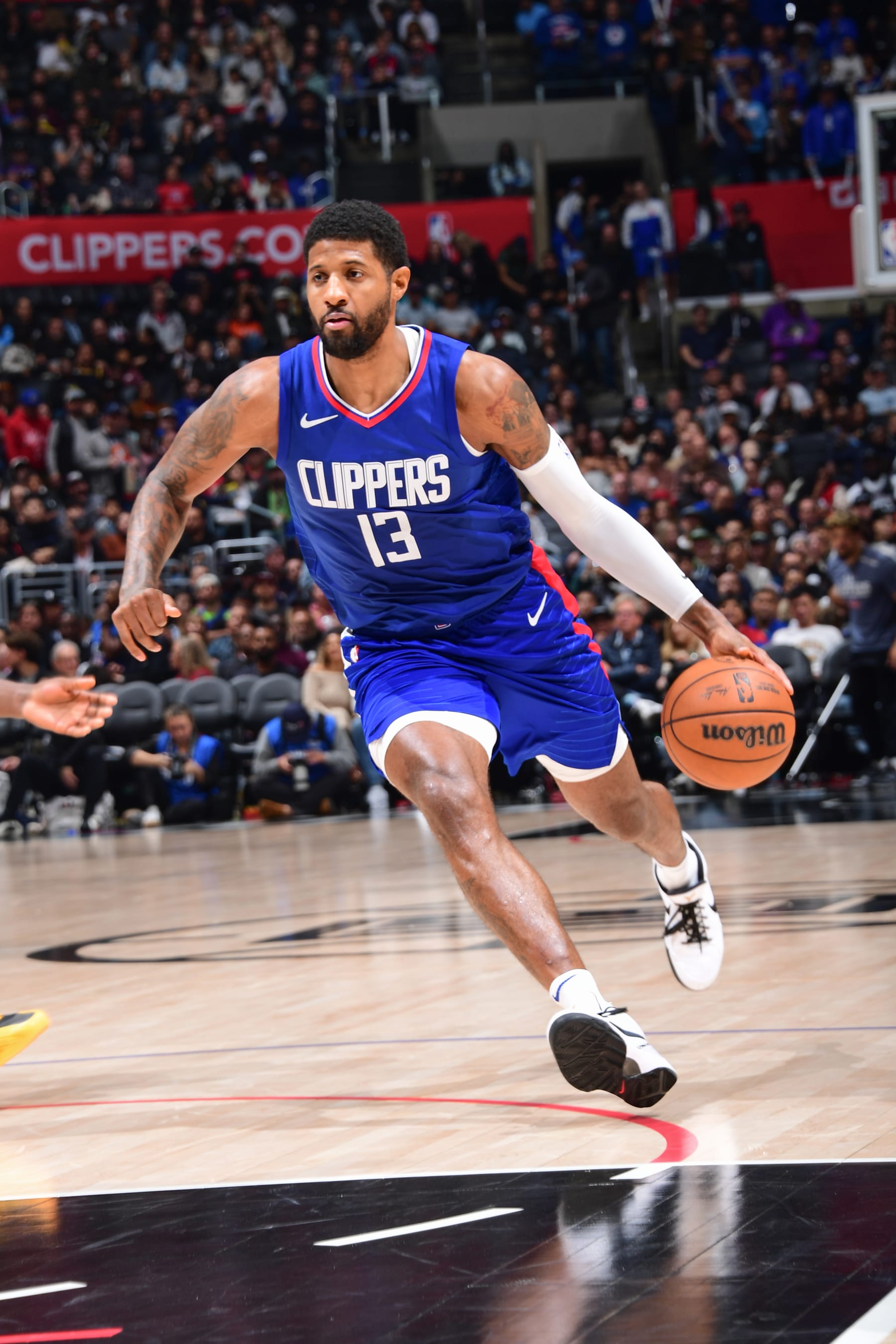 LOS ANGELES, CA - FEBRUARY 12:  Paul George #13 of the LA Clippers goes to the basket during the game on February 12, 2024 at Crypto.Com Arena in Los Angeles, California. NOTE TO USER: User expressly acknowledges and agrees that, by downloading and/or using this Photograph, user is consenting to the terms and conditions of the Getty Images License Agreement. Mandatory Copyright Notice: Copyright 2024 NBAE (Photo by Adam Pantozzi/NBAE via Getty Images)