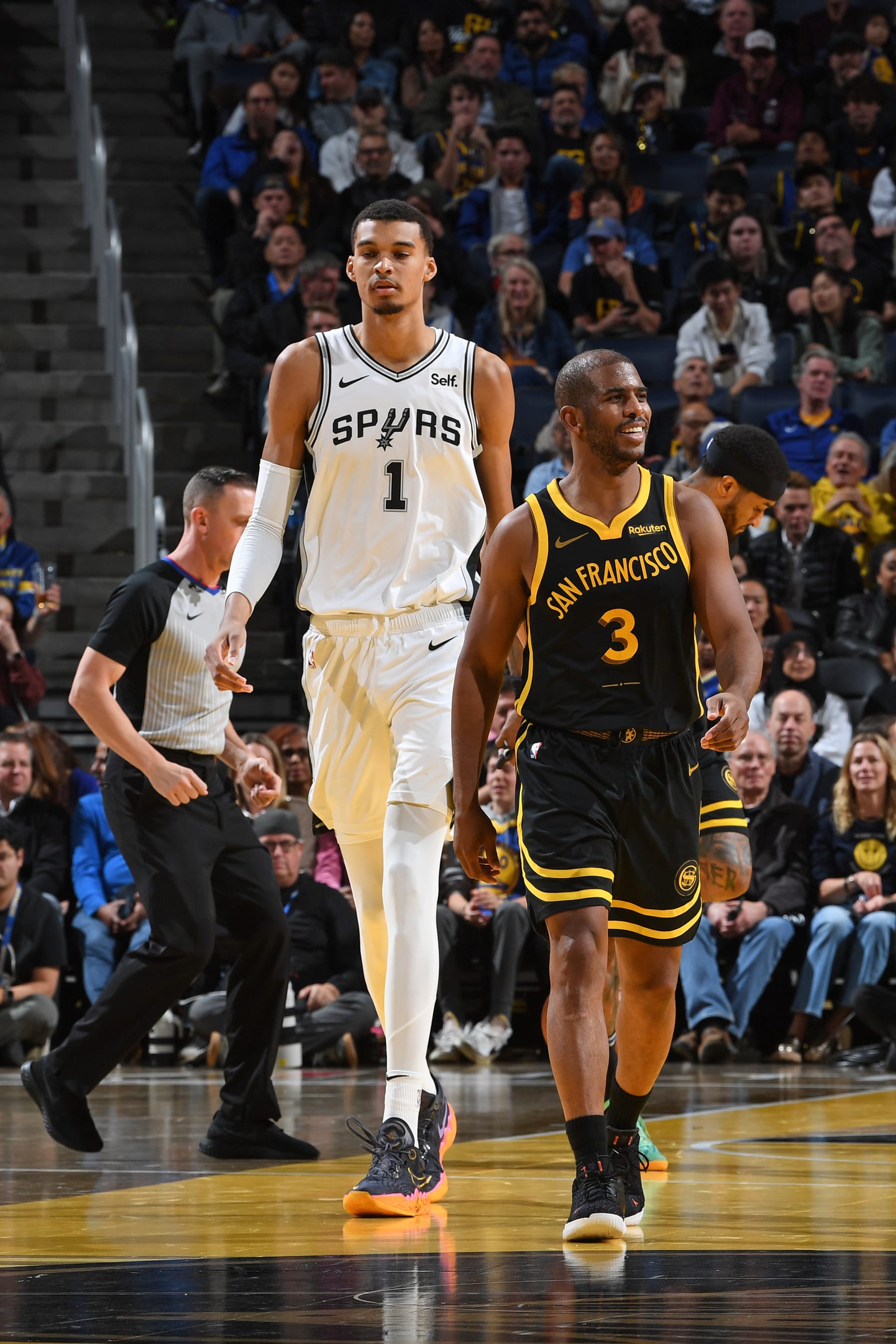 SAN FRANCISCO, CA - NOVEMBER 24: Victor Wembanyama #1 of the San Antonio Spurs and Chris Paul #3 of the Golden State Warriors on the court during the game during the in-Season Tournament on November 24, 2023 at Chase Center in San Francisco, California. NOTE TO USER: User expressly acknowledges and agrees that, by downloading and or using this photograph, user is consenting to the terms and conditions of Getty Images License Agreement. Mandatory Copyright Notice: Copyright 2023 NBAE (Photo by Noah Graham/NBAE via Getty Images)