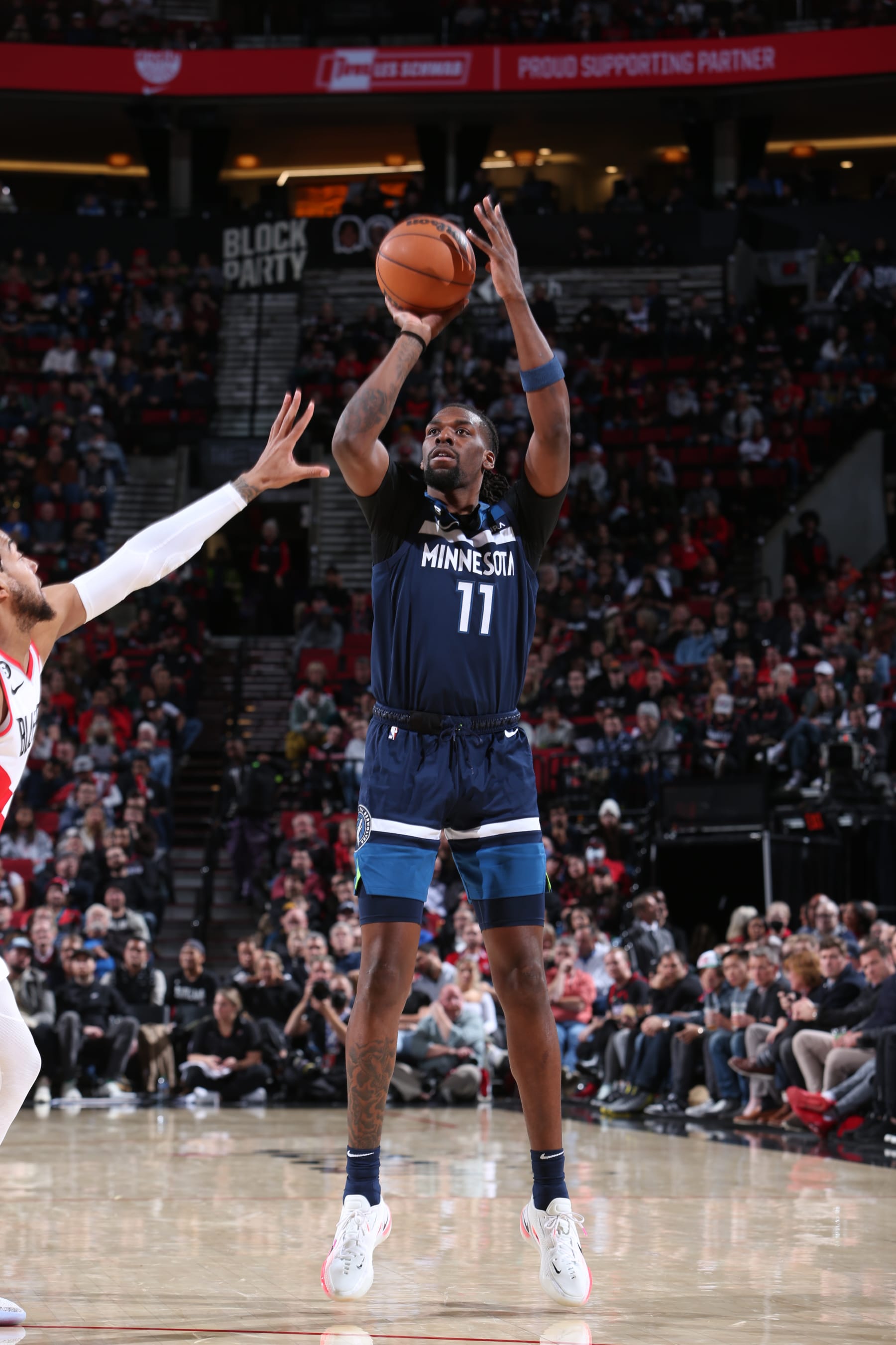 PORTLAND, OR - DECEMBER 12: Naz Reid #11 of the Minnesota Timberwolves shoots the ball during the game against the Portland Trail Blazers on December 12, 2022 at the Moda Center Arena in Portland, Oregon. NOTE TO USER: User expressly acknowledges and agrees that, by downloading and or using this photograph, user is consenting to the terms and conditions of the Getty Images License Agreement. Mandatory Copyright Notice: Copyright 2022 NBAE (Photo by Sam Forencich/NBAE via Getty Images)