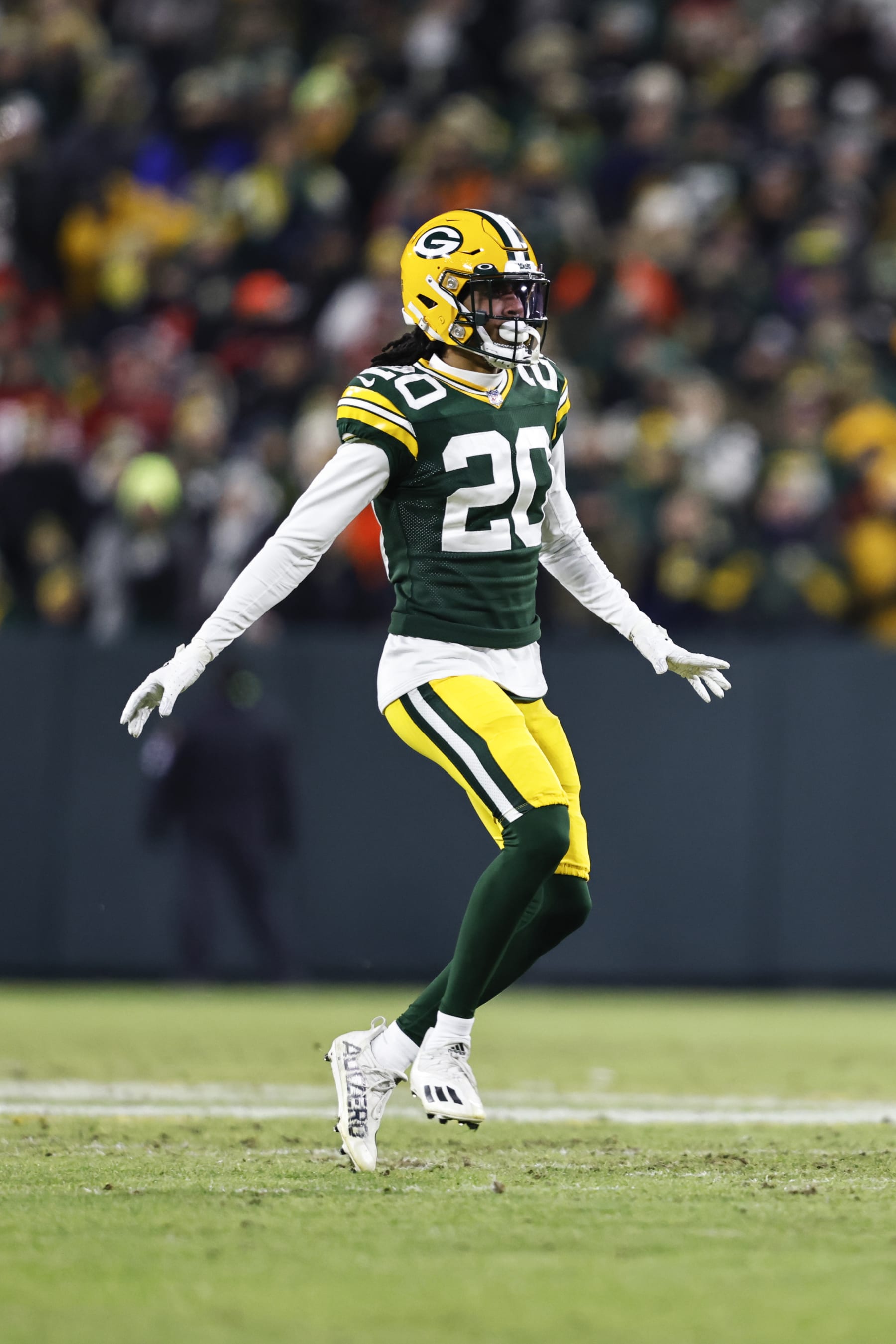 GREEN BAY, WISCONSIN - JANUARY 22: Kevin King #20 of the Green Bay Packers defends as he runs during an NFL divisional playoff football game against the San Francisco 49ers at Lambeau Field on January 22, 2022 in Green Bay, Wisconsin. The 49ers won 13-10. (Photo by Michael Owens/Getty Images)