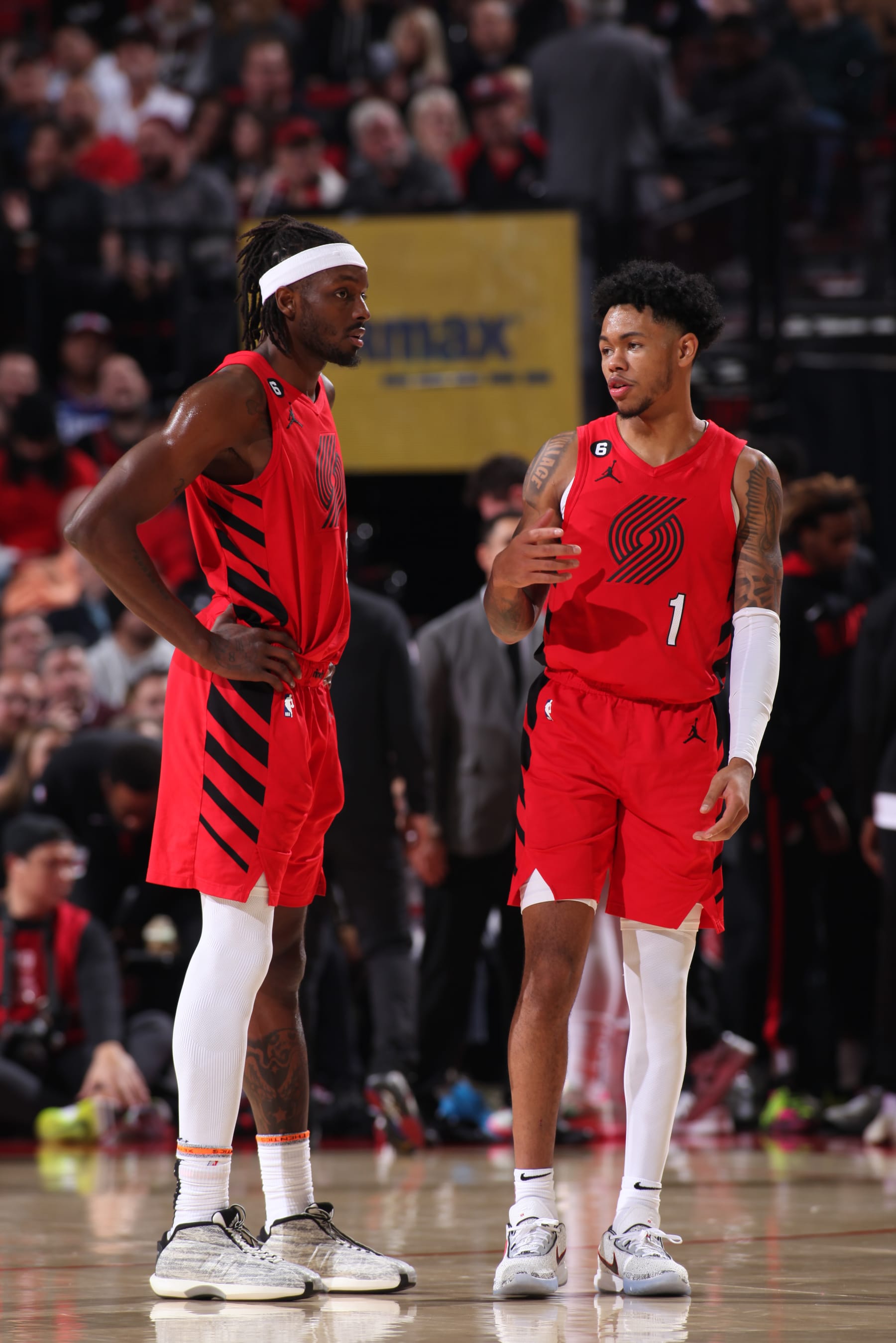 PORTLAND, OR - NOVEMBER 29: Jerami Grant #9 and Anfernee Simons #1 of the Portland Trail Blazers talk against the LA Clippers on November 29, 2022 at the Moda Center Arena in Portland, Oregon. NOTE TO USER: User expressly acknowledges and agrees that, by downloading and or using this photograph, user is consenting to the terms and conditions of the Getty Images License Agreement. Mandatory Copyright Notice: Copyright 2022 NBAE (Photo by Cameron Browne/NBAE via Getty Images)