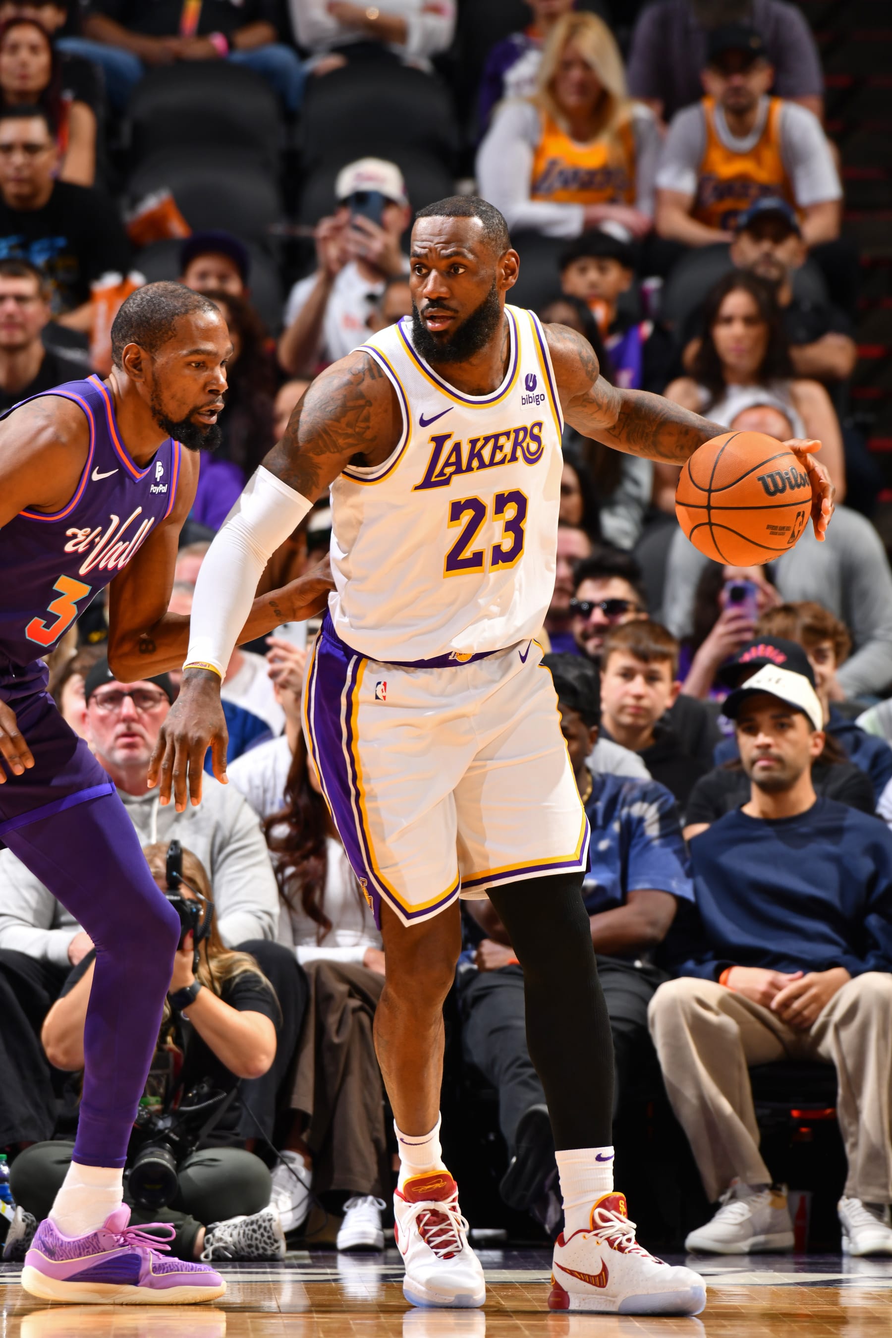 PHOENIX, AZ - FEBRUARY 25: LeBron James #23 of the Los Angeles Lakers looks on during the game against the Phoenix Suns on February 25, 2024 at Footprint Center in Phoenix, Arizona. NOTE TO USER: User expressly acknowledges and agrees that, by downloading and or using this photograph, user is consenting to the terms and conditions of the Getty Images License Agreement. Mandatory Copyright Notice: Copyright 2024 NBAE (Photo by Barry Gossage/NBAE via Getty Images)