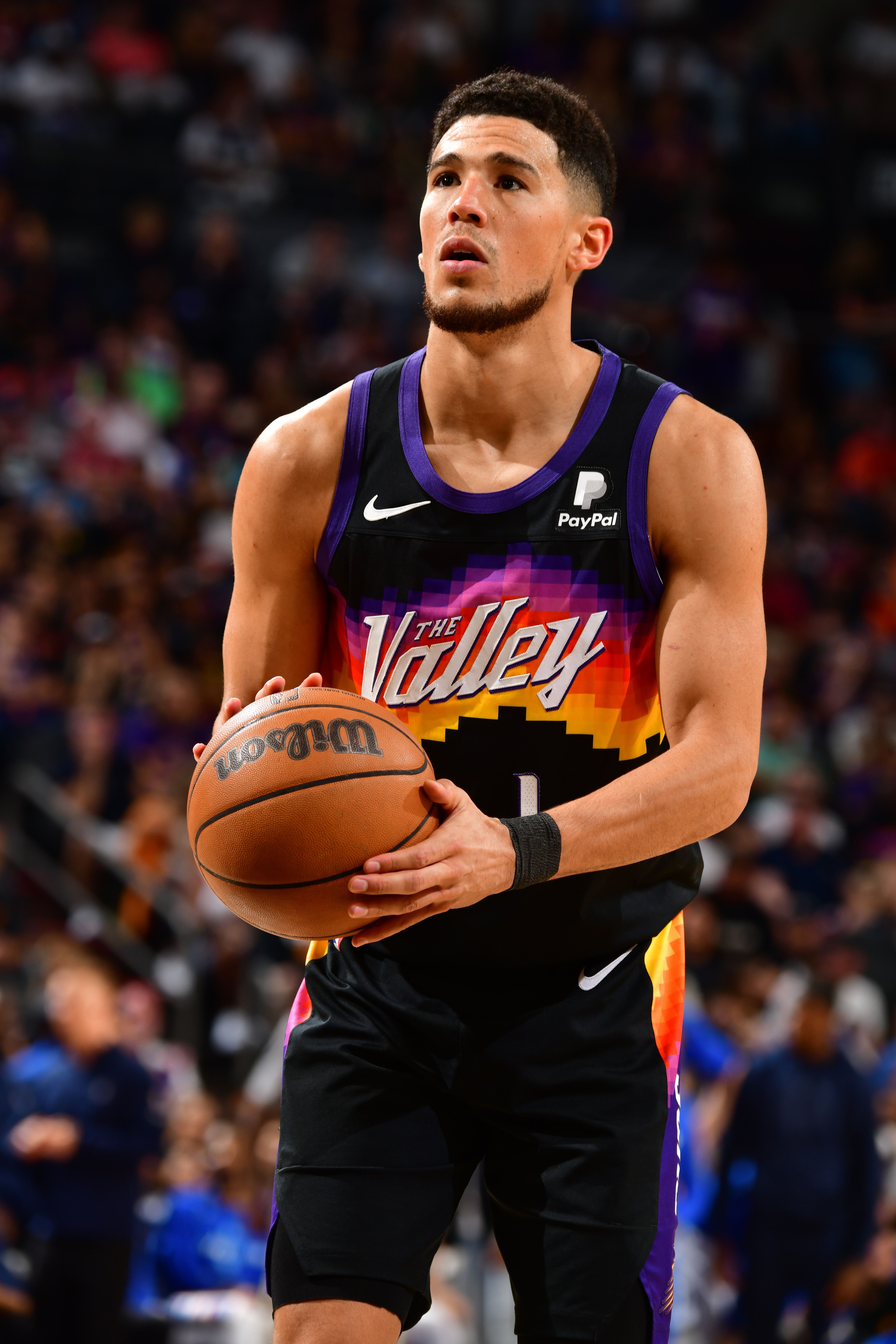 PHOENIX, AZ - MAY 15: Devin Booker #1 of the Phoenix Suns shoots a free throw against the Dallas Mavericks during Game 7 of the 2022 NBA Playoffs Western Conference Semifinals on May 15, 2022 at Footprint Center in Phoenix, Arizona. NOTE TO USER: User expressly acknowledges and agrees that, by downloading and or using this photograph, user is consenting to the terms and conditions of the Getty Images License Agreement. Mandatory Copyright Notice: Copyright 2022 NBAE (Photo by Barry Gossage/NBAE via Getty Images)