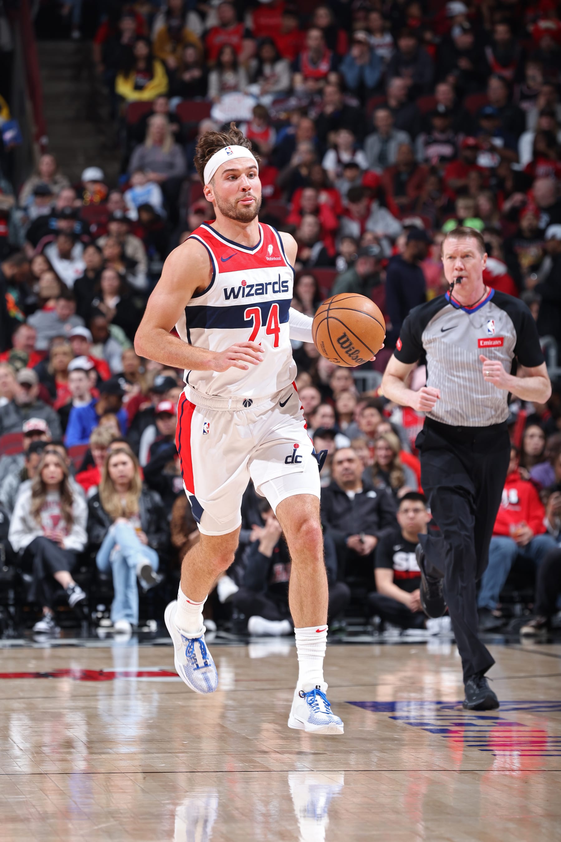 CHICAGO, IL - MARCH 25: Corey Kispert #24 of the Washington Wizards dribbles the ball during the game against the Chicago Bulls  on March 25, 2024 at United Center in Chicago, Illinois. NOTE TO USER: User expressly acknowledges and agrees that, by downloading and or using this photograph, User is consenting to the terms and conditions of the Getty Images License Agreement. Mandatory Copyright Notice: Copyright 2024 NBAE (Photo by Jeff Haynes/NBAE via Getty Images)