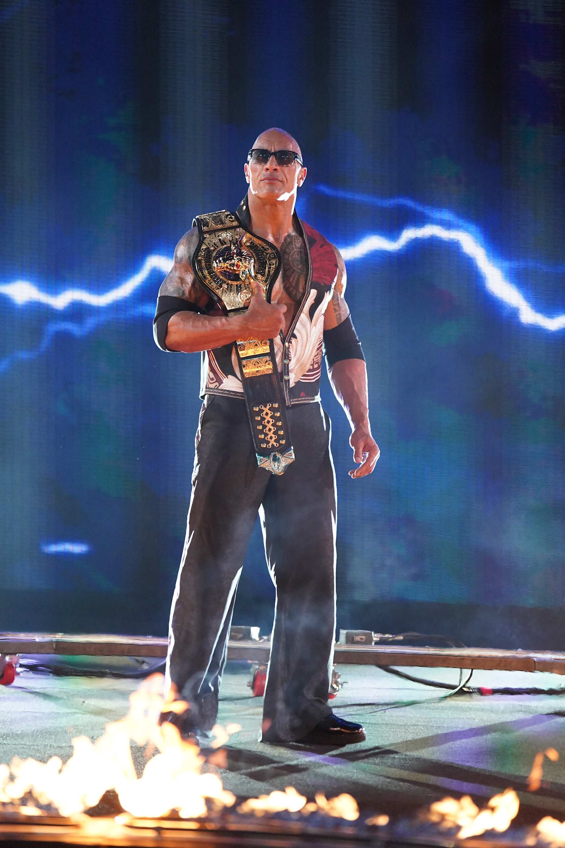 PHILADELPHIA, PENNSYLVANIA - APRIL 6: The Rock making his entrance to the ring at WrestleMania 40 at Lincoln Financial Field on April 6, 2024 in Philadelphia, Pennsylvania. (Photo by WWE/Getty Images)