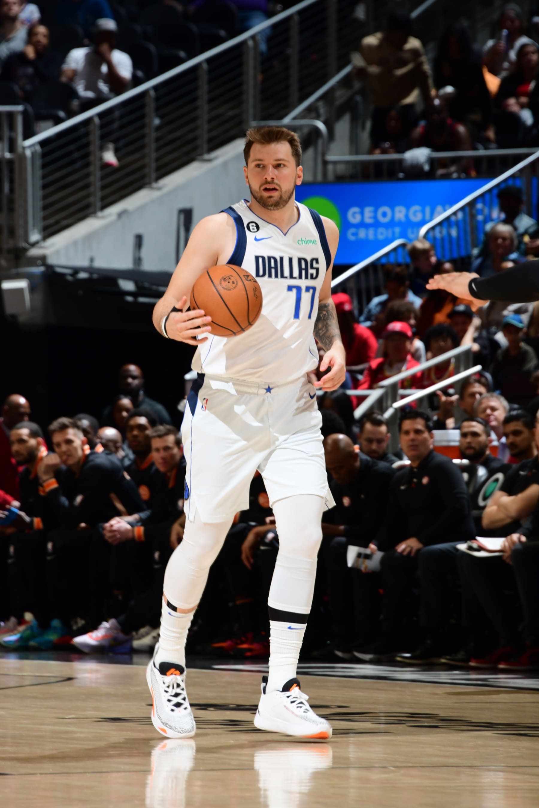 ATLANTA, GA - APRIL 2: Luka Doncic #77 of the Dallas Mavericks dribbles the ball during the game against the Atlanta Hawks on April 2, 2023 at State Farm Arena in Atlanta, Georgia.  NOTE TO USER: User expressly acknowledges and agrees that, by downloading and/or using this Photograph, user is consenting to the terms and conditions of the Getty Images License Agreement. Mandatory Copyright Notice: Copyright 2023 NBAE (Photo by Scott Cunningham/NBAE via Getty Images)