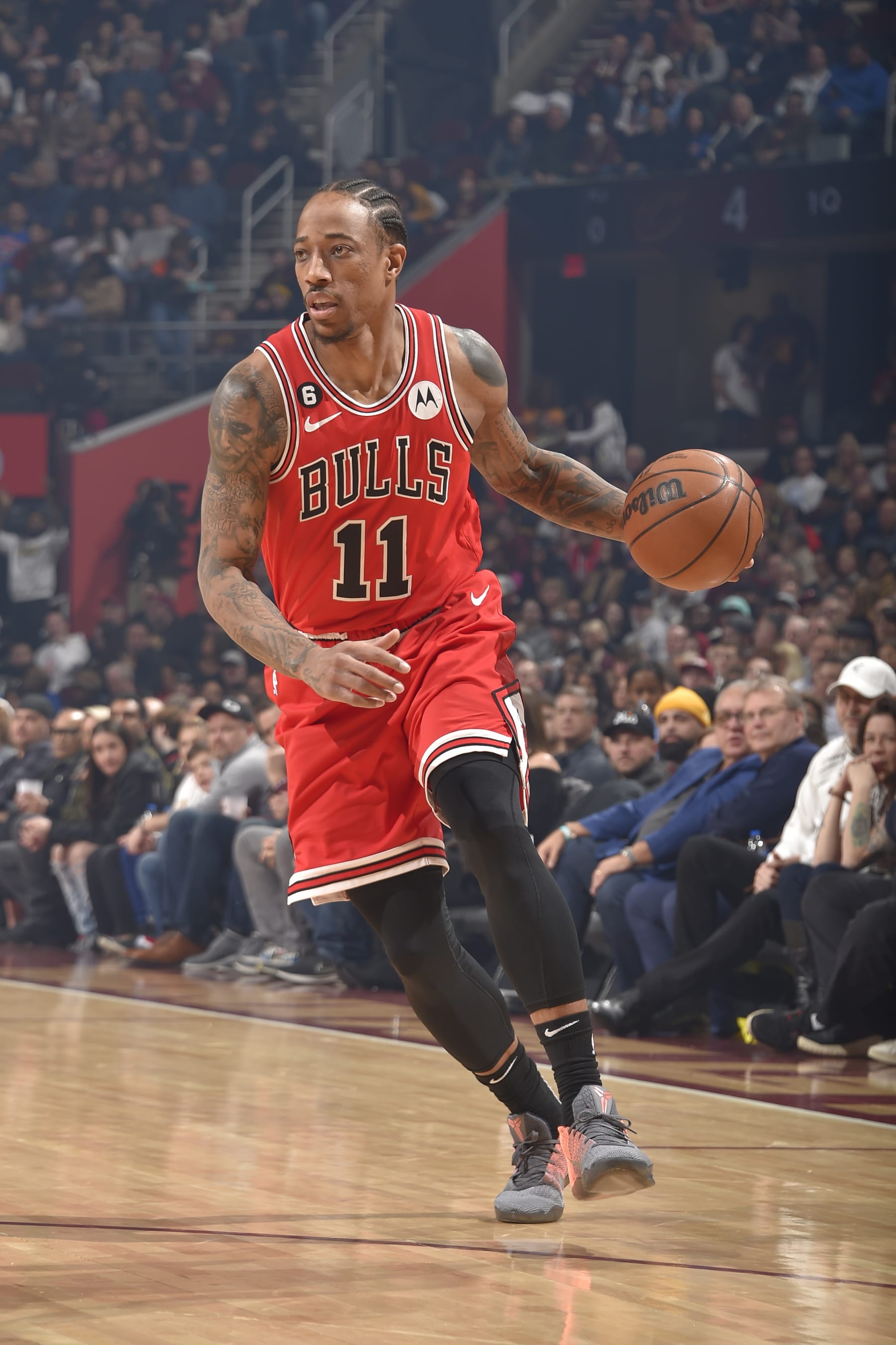 CLEVELAND, OH - FEBRUARY 11: DeMar DeRozan #11 of the Chicago Bulls dribbles the ball during the game against the Cleveland Cavaliers  on February 11, 2023 at Rocket Mortgage FieldHouse in Cleveland, Ohio. NOTE TO USER: User expressly acknowledges and agrees that, by downloading and/or using this Photograph, user is consenting to the terms and conditions of the Getty Images License Agreement. Mandatory Copyright Notice: Copyright 2023 NBAE (Photo by David Liam Kyle/NBAE via Getty Images)