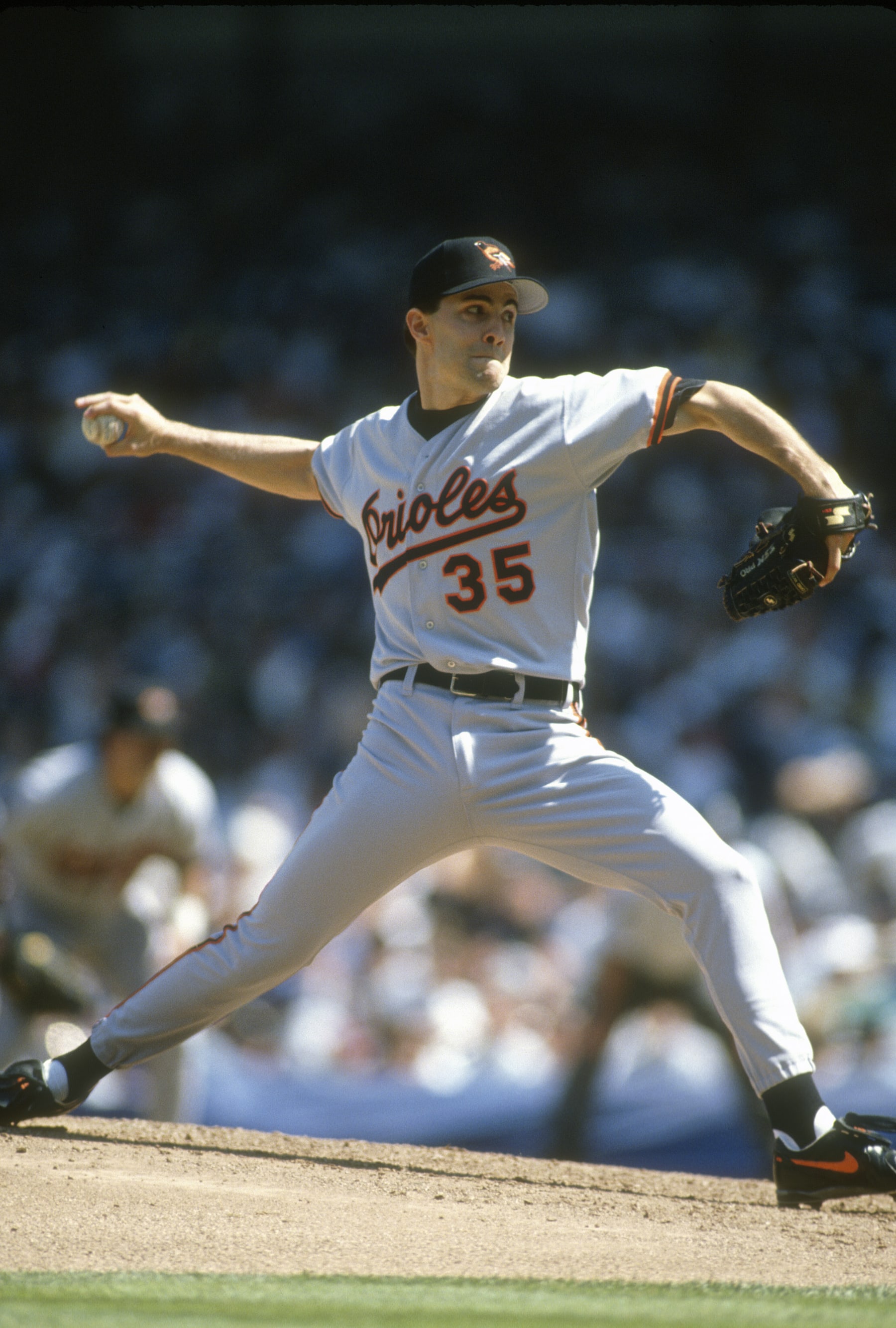 NEW YORK -  CIRCA 1996: Mike Mussina #35 of the Baltimore Orioles pitches against the New York Yankees during an Major League Baseball game circa 1996 at Yankee Stadium in the Bronx borough of New York City. Mussina played for the Orioles from 1991 - 2000. (Photo by Focus on Sport/Getty Images)