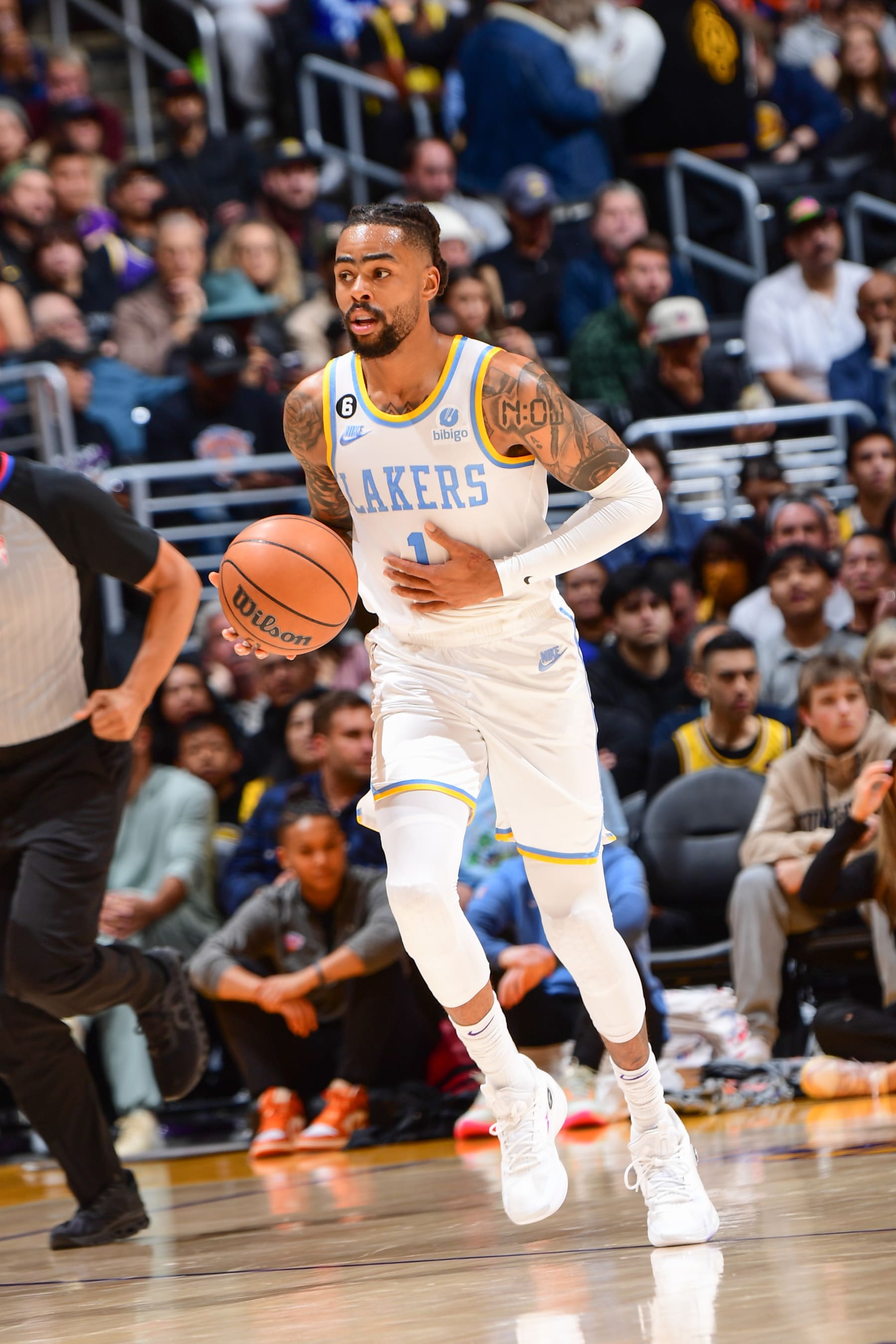 LOS ANGELES, CA - MARCH 12:  D'Angelo Russell #1 of the Los Angeles Lakers goes to the basket during the game on March 12, 2023 at Crypto.Com Arena in Los Angeles, California. NOTE TO USER: User expressly acknowledges and agrees that, by downloading and/or using this Photograph, user is consenting to the terms and conditions of the Getty Images License Agreement. Mandatory Copyright Notice: Copyright 2023 NBAE (Photo by Adam Pantozzi/NBAE via Getty Images)