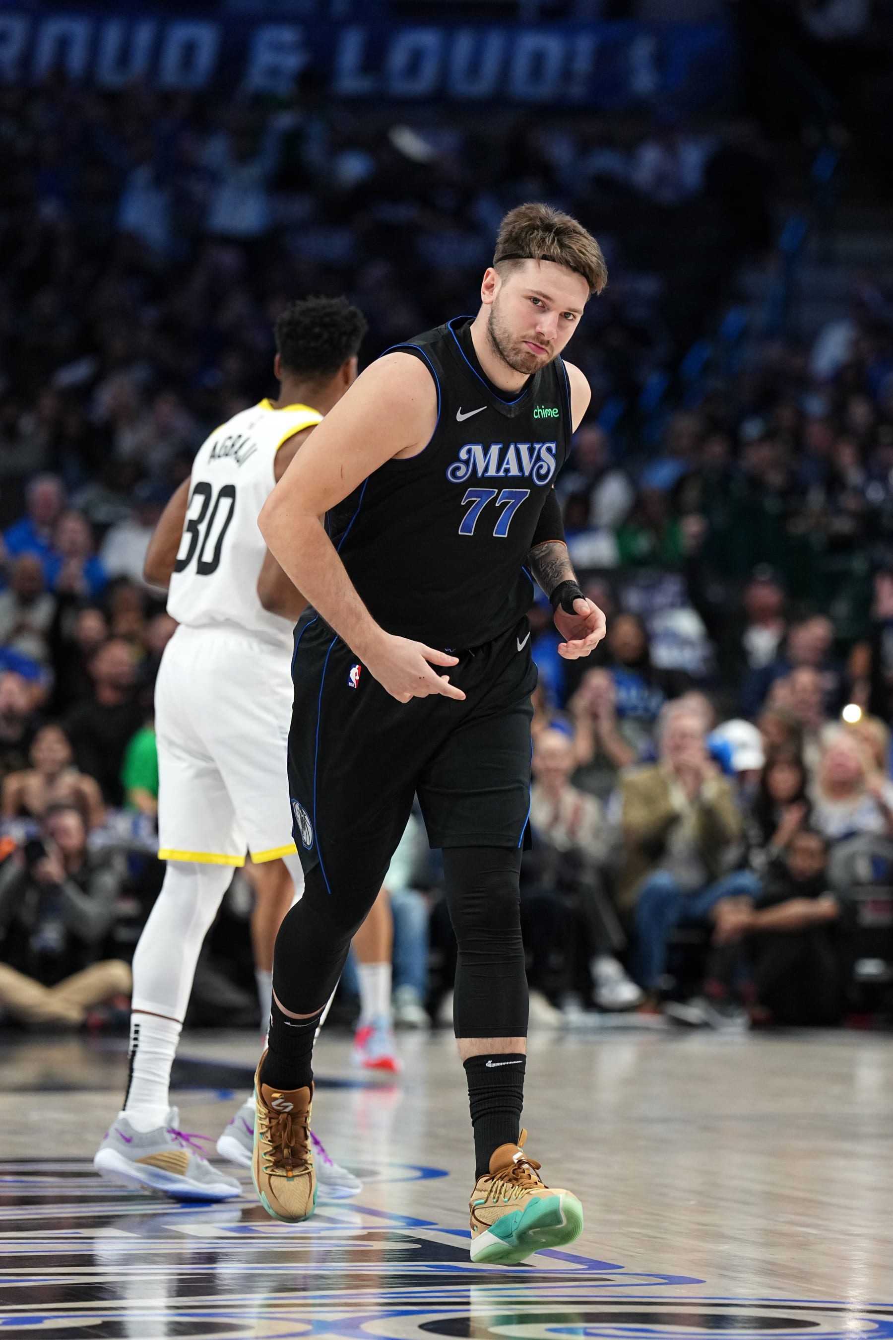 DALLAS, TX - DECEMBER 6 : Luka Doncic #77 of the Dallas Mavericks looks on during the game against the Utah Jazz on December 6, 2023 at the American Airlines Center in Dallas, Texas. NOTE TO USER: User expressly acknowledges and agrees that, by downloading and or using this photograph, User is consenting to the terms and conditions of the Getty Images License Agreement. Mandatory Copyright Notice: Copyright 2023 NBAE (Photo by Glenn James/NBAE via Getty Images)