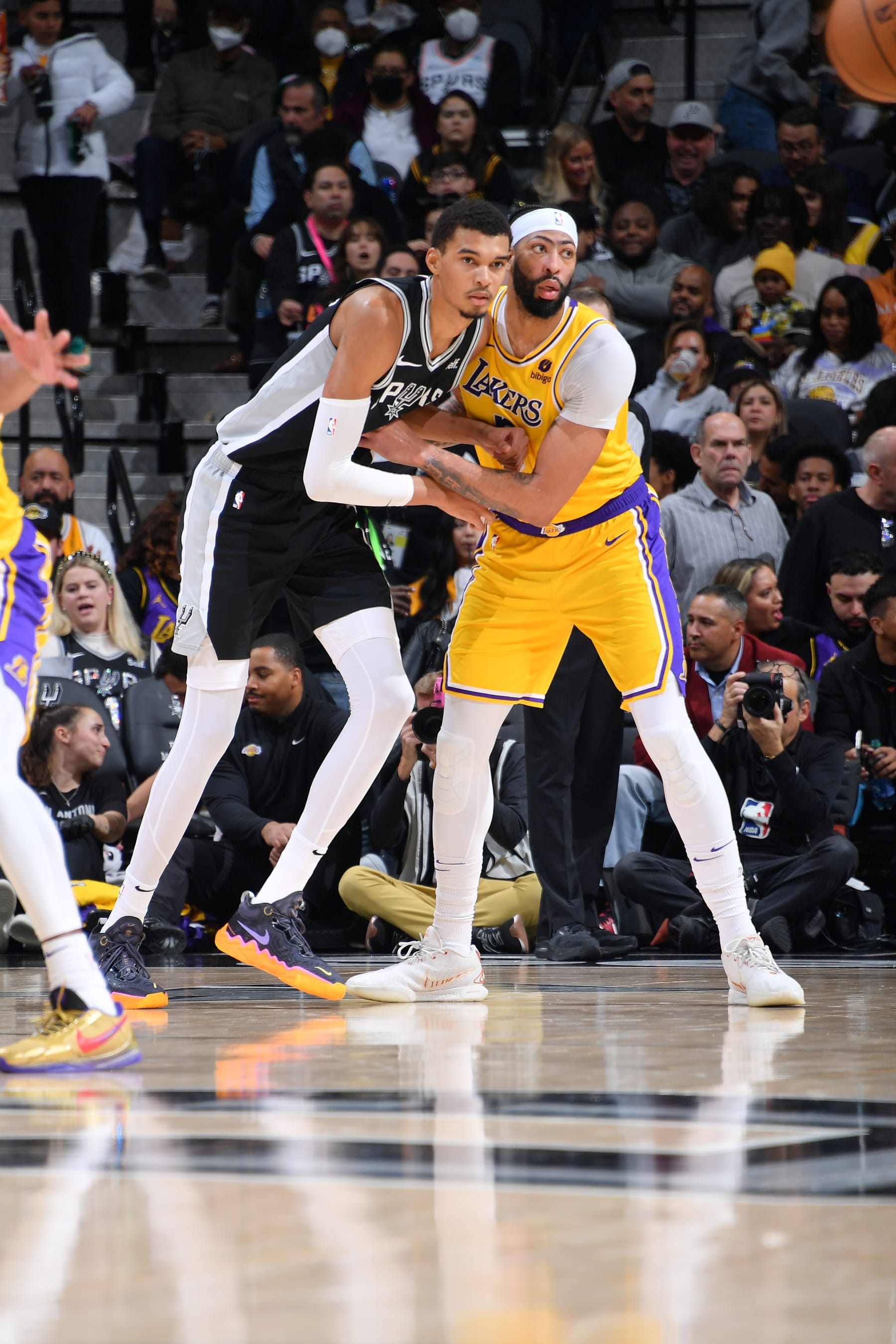SAN ANTONIO, TX - DECEMBER 13: Victor Wembanyama #1 of the San Antonio Spurs and Anthony Davis #3 of the Los Angeles Lakers play defense during the game on December 13, 2023 at the Frost Bank Center in San Antonio, Texas. NOTE TO USER: User expressly acknowledges and agrees that, by downloading and or using this photograph, user is consenting to the terms and conditions of the Getty Images License Agreement. Mandatory Copyright Notice: Copyright 2023 NBAE (Photos by Michael Gonzales/NBAE via Getty Images)