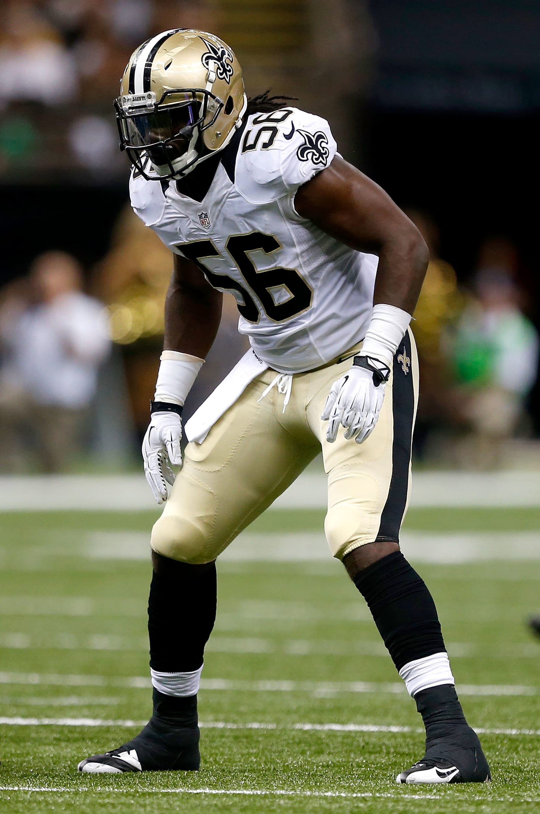 NEW ORLEANS, LA - AUGUST 15:  Ronald Powell #56 of the New Orleans Saints reacts to a play during a preseason game against the Tennessee Titans at the Mercedes-Benz Superdome on August 15, 2014 in New Orleans, Louisiana.  (Photo by Sean Gardner/Getty Images)