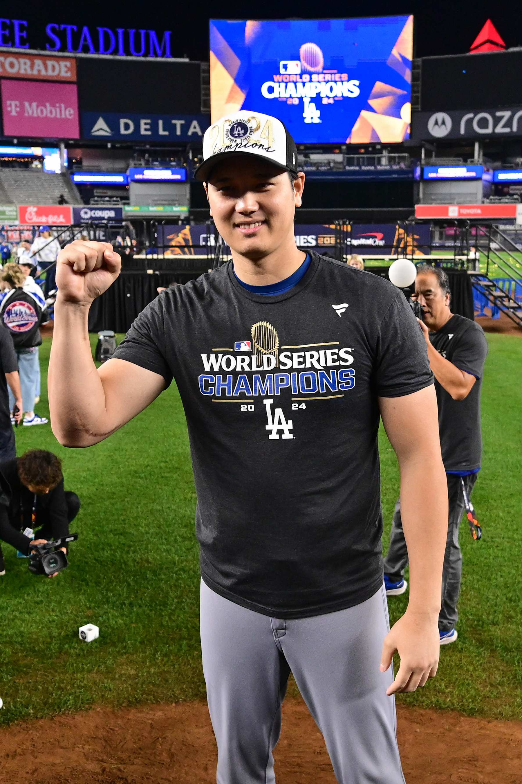 NEW YORK, NY - OCTOBER 30:   Shohei Ohtani #17 of the Los Angeles Dodgers celebrates on the field after the Dodgers won Game 5 to win the 2024 World Series presented by Capital One between the Los Angeles Dodgers and the New York Yankees at Yankee Stadium on Wednesday, October 30, 2024 in New York, New York. (Photo by Mike Lawrence/MLB Photos via Getty Images)