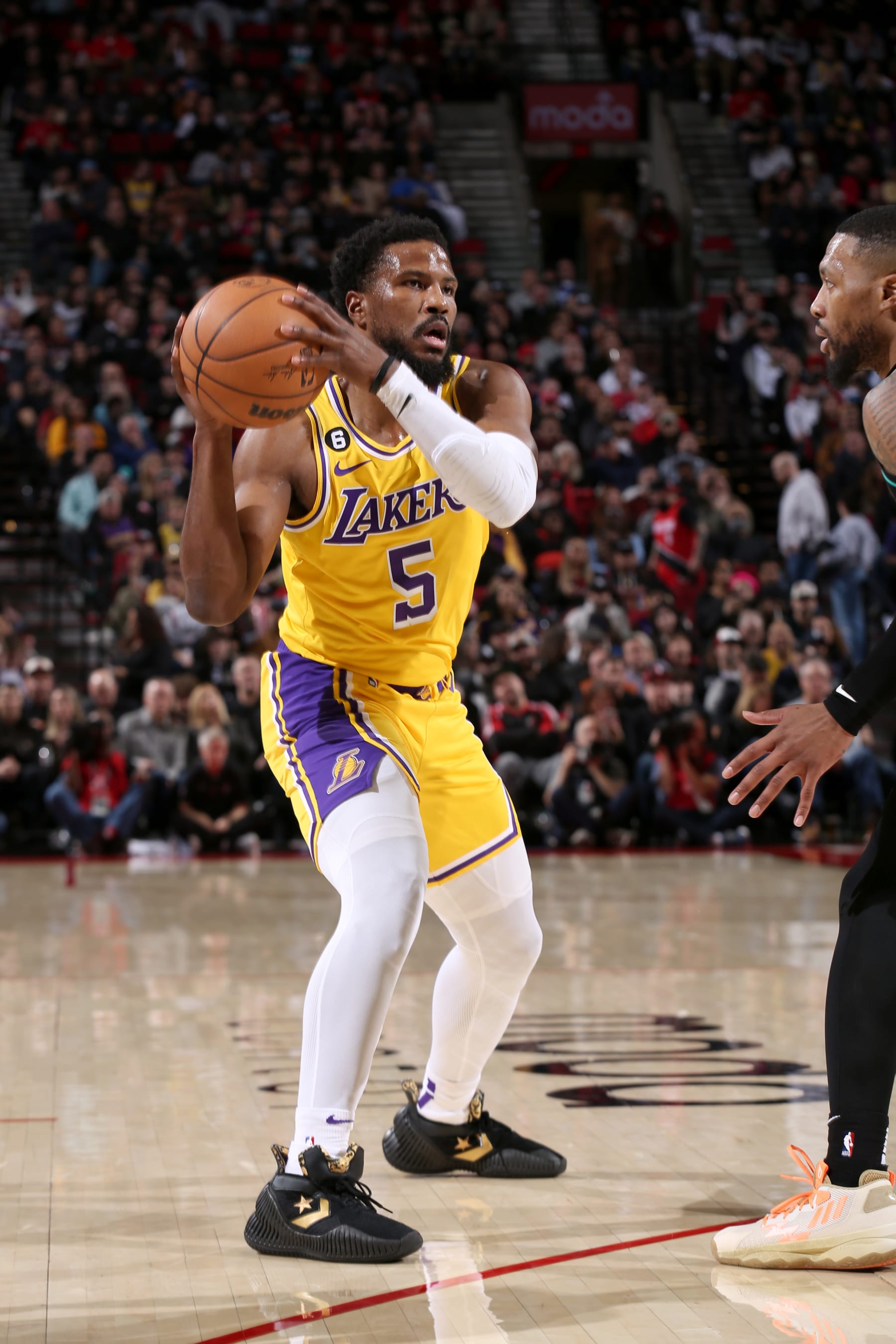 PORTLAND, OR - FEBRUARY 13: Malik Beasley #5 of the Los Angeles Lakers handles the ball during the game against the Portland Trail Blazers on February 13, 2023 at the Moda Center Arena in Portland, Oregon. NOTE TO USER: User expressly acknowledges and agrees that, by downloading and or using this photograph, user is consenting to the terms and conditions of the Getty Images License Agreement. Mandatory Copyright Notice: Copyright 2023 NBAE (Photo by Cameron Browne/NBAE via Getty Images)