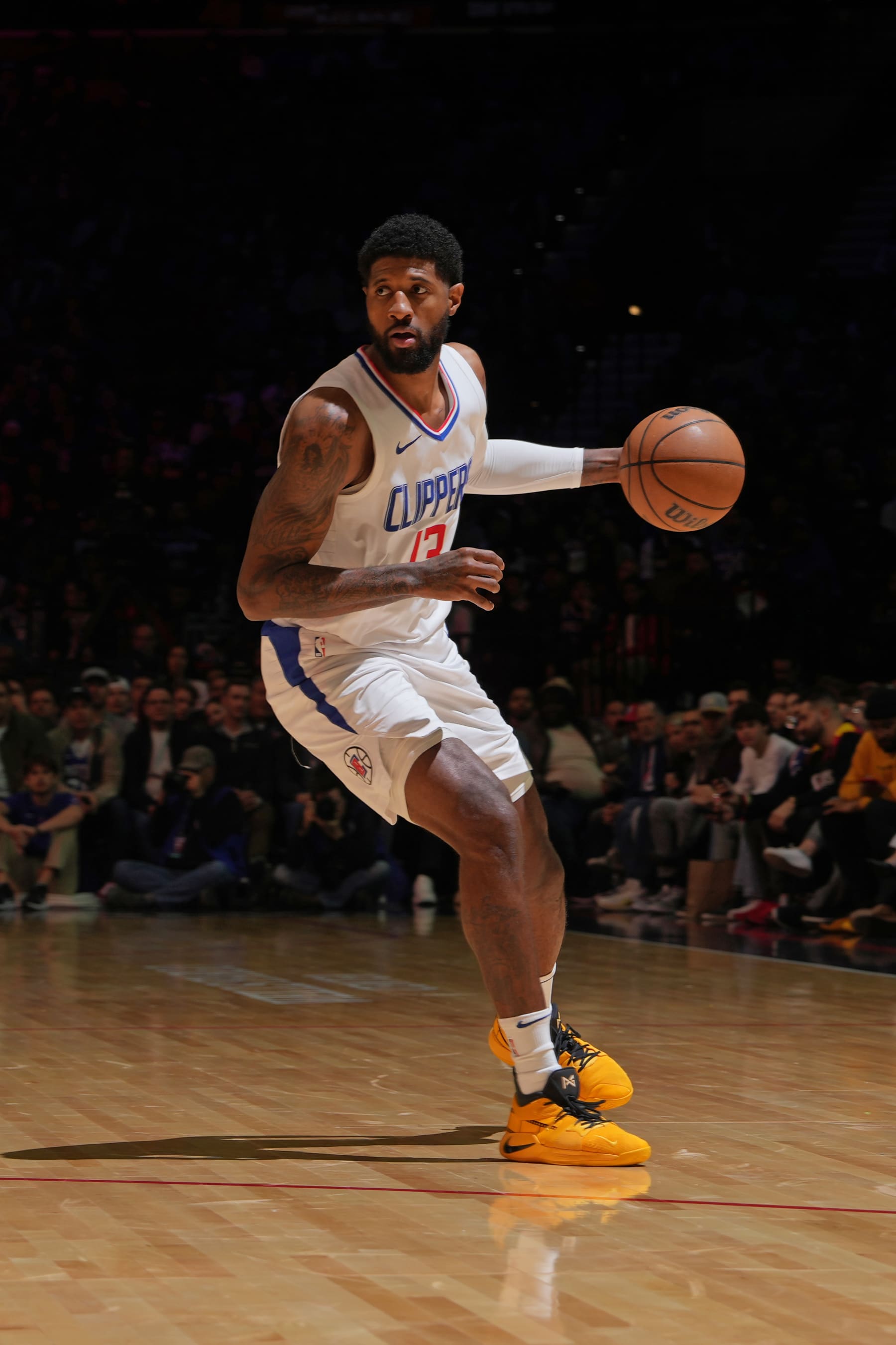 PHILADELPHIA, PA - MARCH 27: Paul George #13 of the LA Clippers dribbles the ball during the game against the Philadelphia 76ers on March 27, 2024 at the Wells Fargo Center in Philadelphia, Pennsylvania NOTE TO USER: User expressly acknowledges and agrees that, by downloading and/or using this Photograph, user is consenting to the terms and conditions of the Getty Images License Agreement. Mandatory Copyright Notice: Copyright 2024 NBAE (Photo by Jesse D. Garrabrant/NBAE via Getty Images)