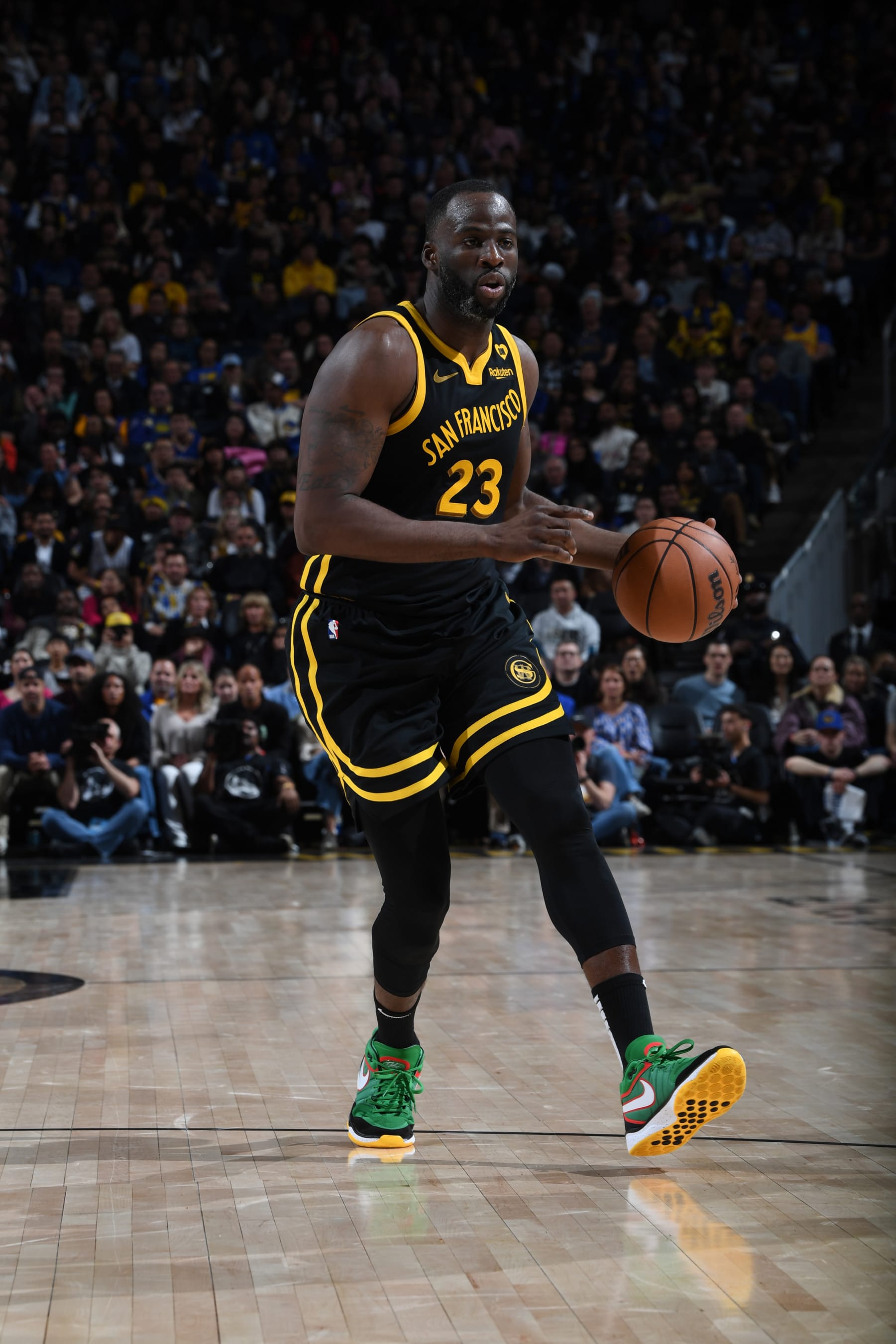 SAN FRANCISCO, CA - FEBRUARY 14: Draymond Green #23 of the Golden State Warriors dribbles the ball during the game against the LA Clippers on FEBRUARY 14, 2024 at Chase Center in San Francisco, California. NOTE TO USER: User expressly acknowledges and agrees that, by downloading and or using this photograph, user is consenting to the terms and conditions of Getty Images License Agreement. Mandatory Copyright Notice: Copyright 2024 NBAE (Photo by Noah Graham/NBAE via Getty Images)