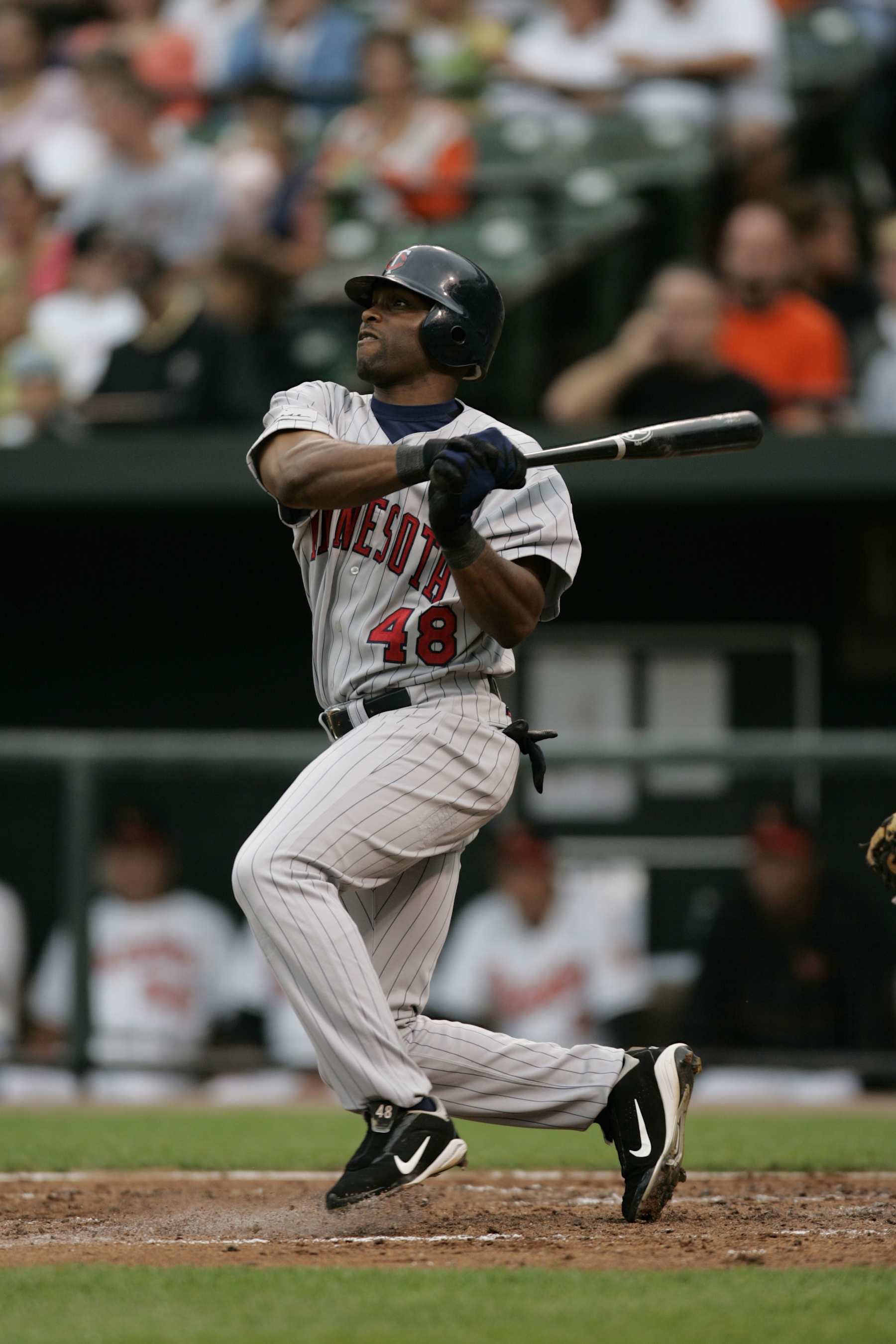 BALTIMORE - SEPTEMBER 6:  Torii Hunter of the Minnesota Twins hits during the game against the Baltimore Orioles at Oriole Park at Camden Yards on September 6, 2004 in Baltimore, Maryland. The Orioles defeated the Twins 4-1. (Photo by Rich Pilling/MLB via Getty Images)