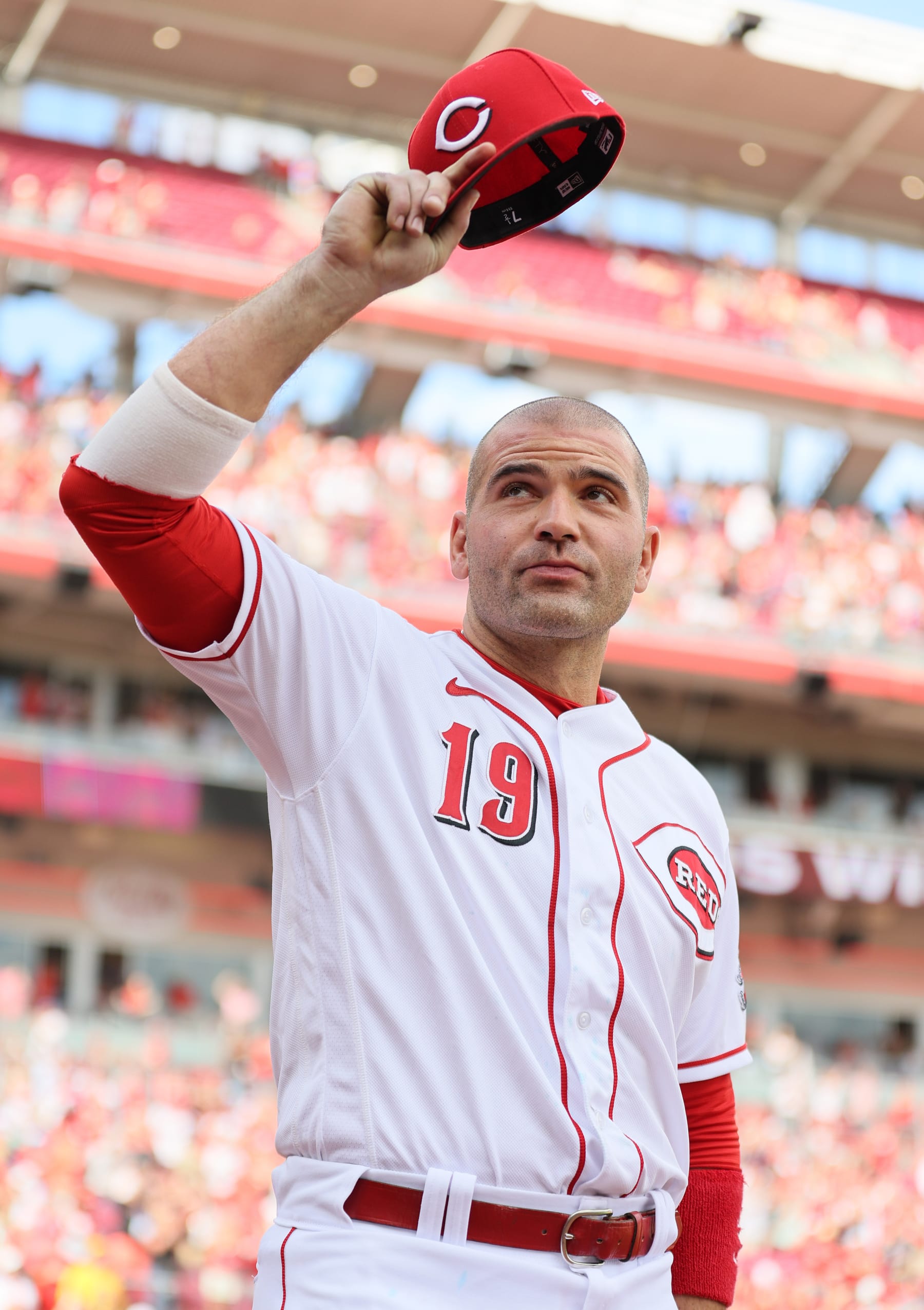 CINCINNATI, OHIO - SEPTEMBER 24: Joey Votto #19 of the Cincinnati Reds acknowledges the crowd after the 4-2 win against the Pittsburgh Pirates at Great American Ball Park on September 24, 2023 in Cincinnati, Ohio. (Photo by Andy Lyons/Getty Images)