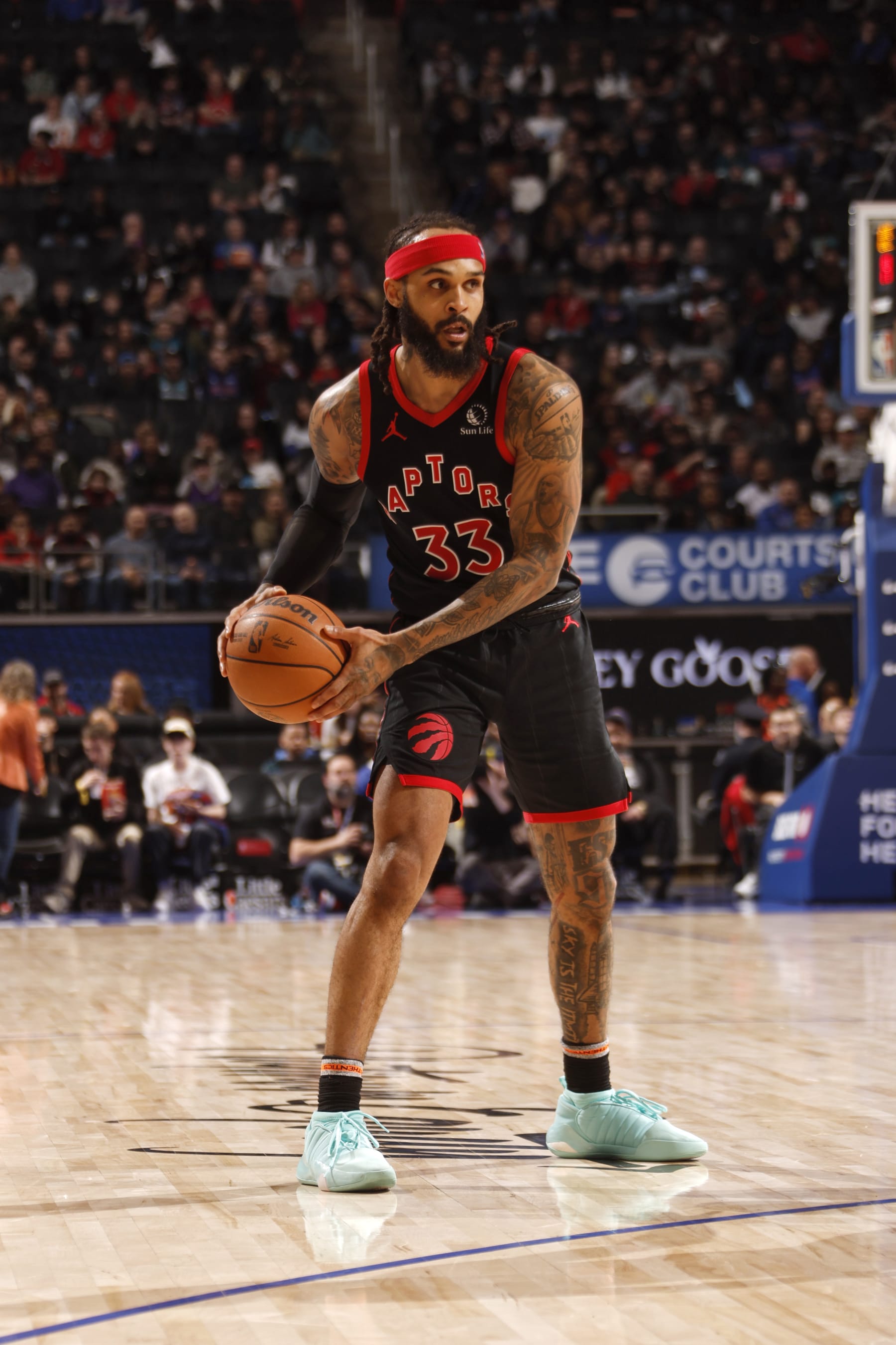 DETROIT, MI - DECEMBER 30: Gary Trent Jr. #33 of the Toronto Raptors looks to pass the ball during the game against the Detroit Pistons on December 30, 2023 at Little Caesars Arena in Detroit, Michigan. NOTE TO USER: User expressly acknowledges and agrees that, by downloading and/or using this photograph, User is consenting to the terms and conditions of the Getty Images License Agreement. Mandatory Copyright Notice: Copyright 2023 NBAE (Photo by Brian Sevald/NBAE via Getty Images)