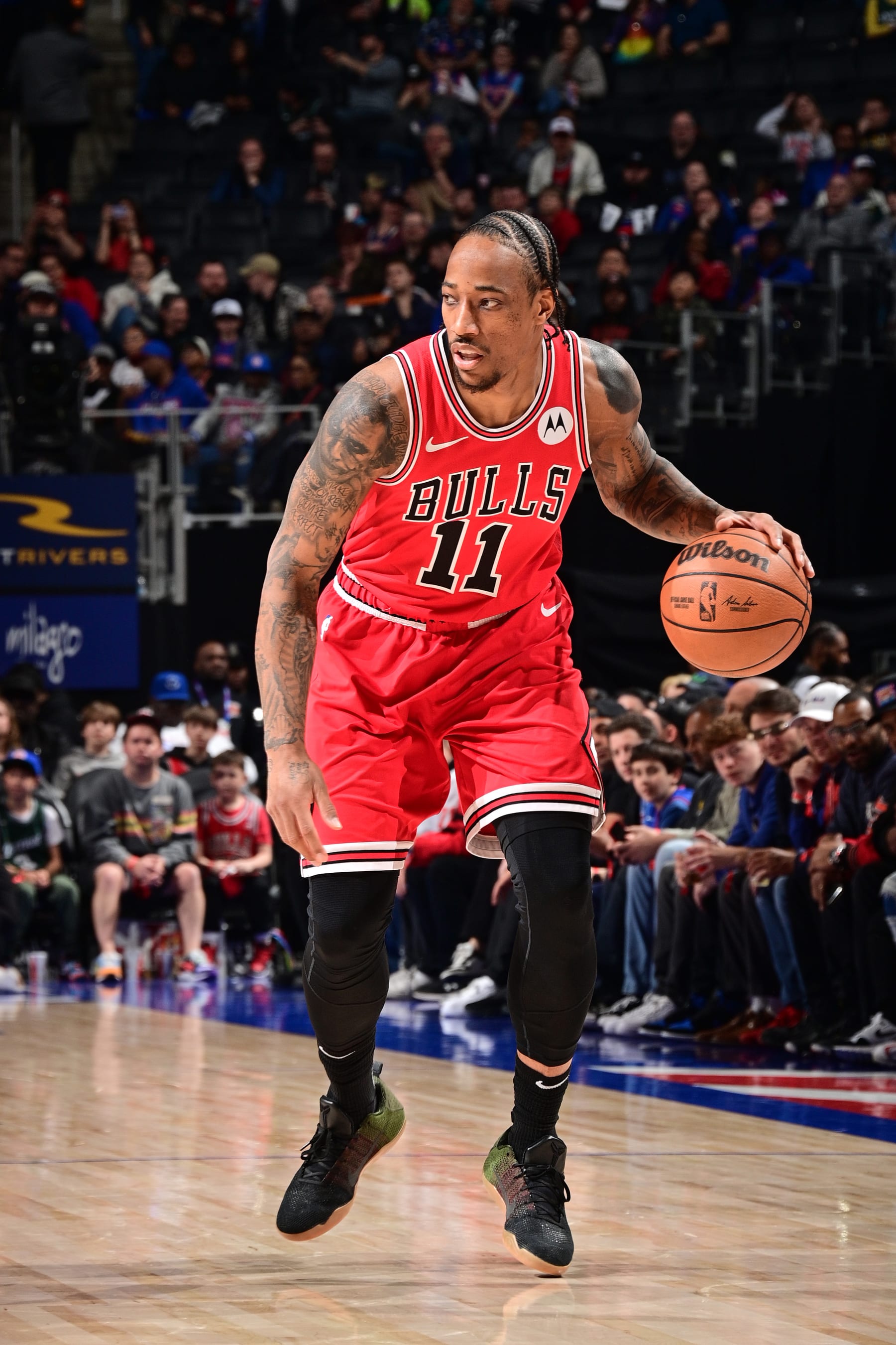DETROIT, MI - APRIL 11: DeMar DeRozan #11 of the Chicago Bulls dribbles the ball during the game against the Detroit Pistons  on April 11, 2024 at Little Caesars Arena in Detroit, Michigan. NOTE TO USER: User expressly acknowledges and agrees that, by downloading and/or using this photograph, User is consenting to the terms and conditions of the Getty Images License Agreement. Mandatory Copyright Notice: Copyright 2024 NBAE (Photo by Chris Schwegler/NBAE via Getty Images)