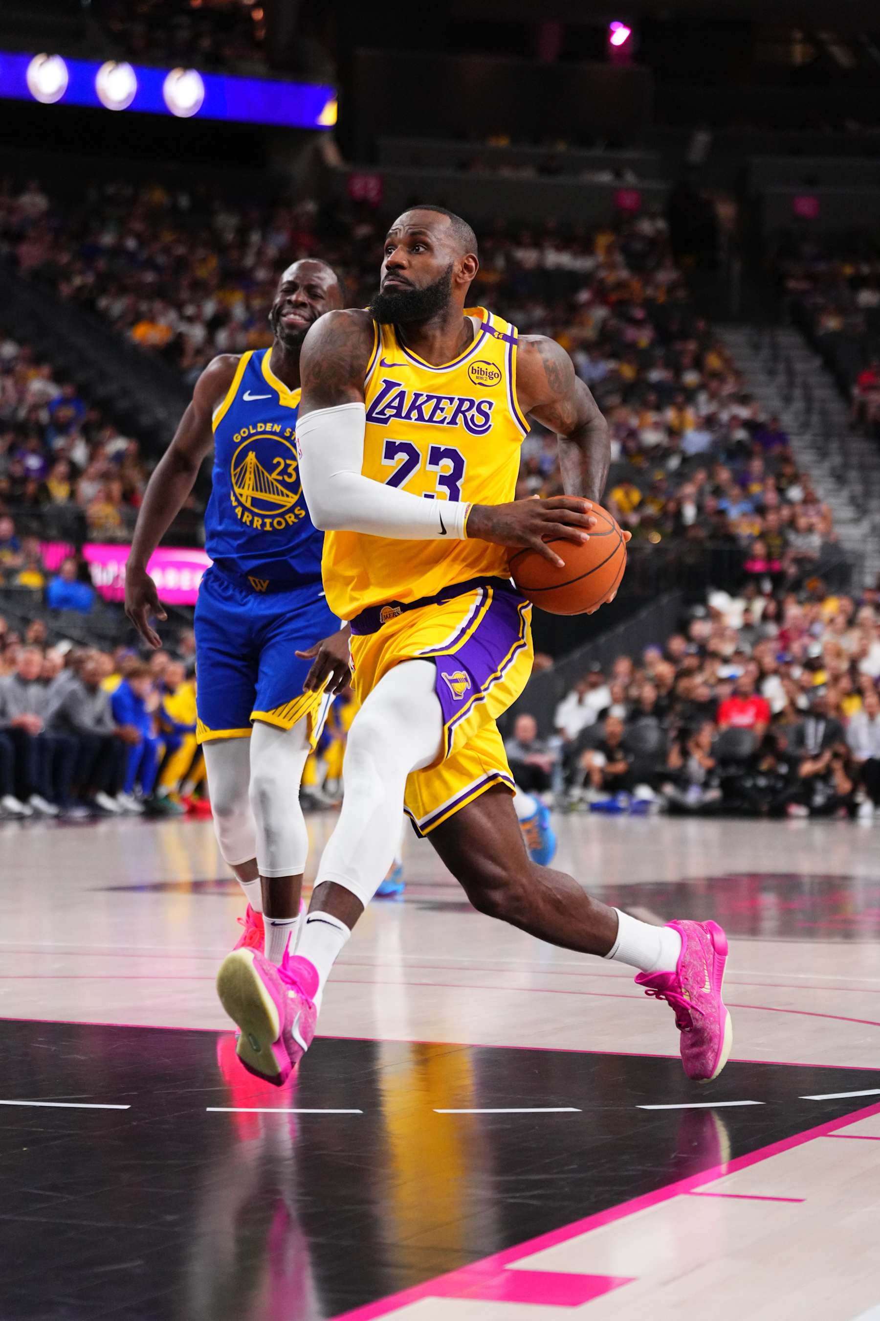 LAS VEGAS, NV - OCTOBER 15: LeBron James #23 of the Los Angeles Lakers drives to the basket during the game against the Golden State Warriors during the 2024 NBA Preseason on October 15, 2024 at T-Mobile Arena in Las Vegas, Nevada. NOTE TO USER: User expressly acknowledges and agrees that, by downloading and or using this photograph, User is consenting to the terms and conditions of the Getty Images License Agreement. Mandatory Copyright Notice: Copyright 2024 NBAE  (Photo by Jeff Bottari/NBAE via Getty Images)