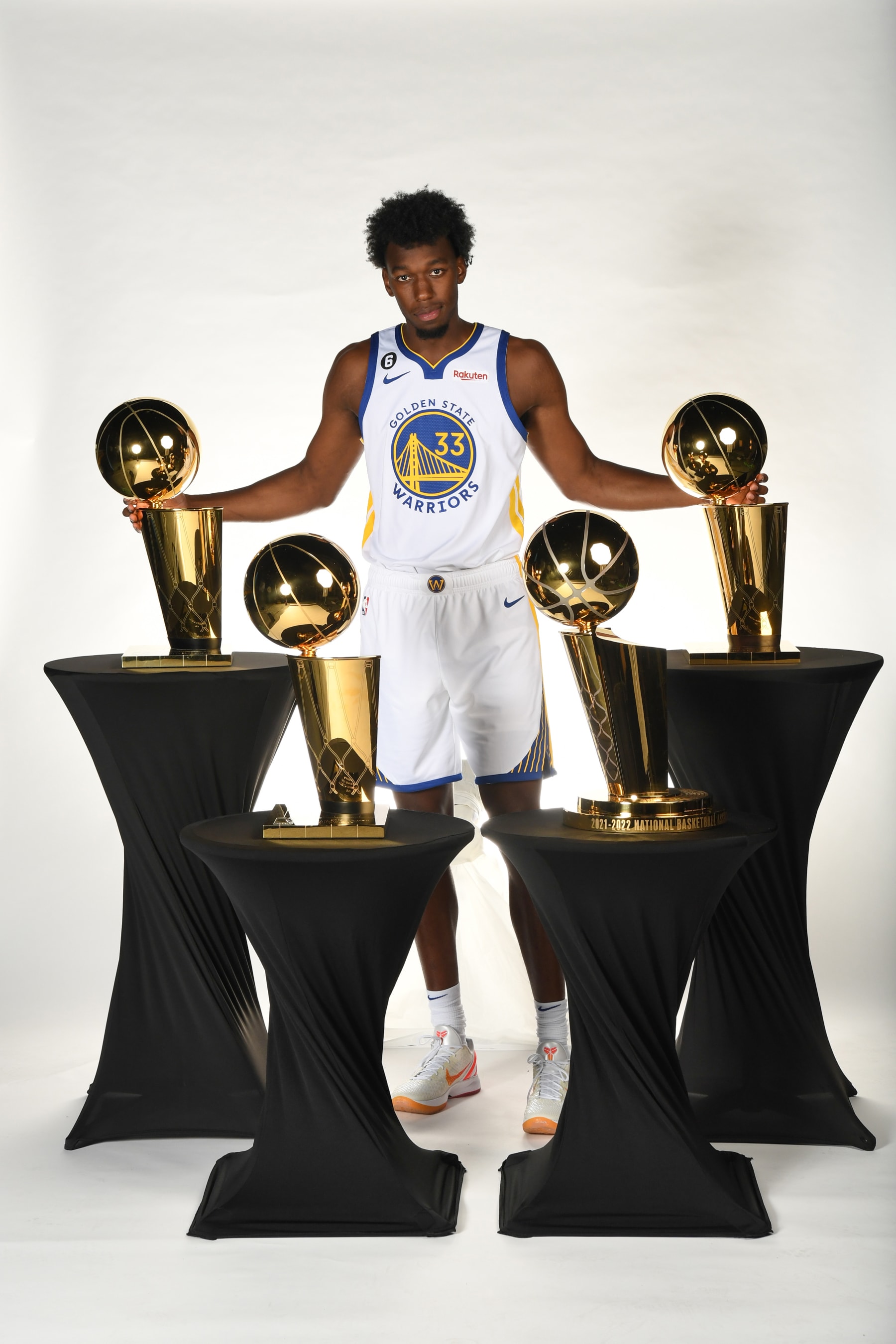 SAN FRANCISCO, CA - SEPTEMBER 25: James Wiseman #33 of the Golden State Warriors poses for a portrait with the Larry OBrien trophies during 2022 NBA Media Day September 25, 2022 at Chase Center in San Francisco, California. NOTE TO USER: User expressly acknowledges and agrees that, by downloading and or using this photograph, user is consenting to the terms and conditions of Getty Images License Agreement. Mandatory Copyright Notice: Copyright 2022 NBAE (Photo by Noah Graham/NBAE via Getty Images)