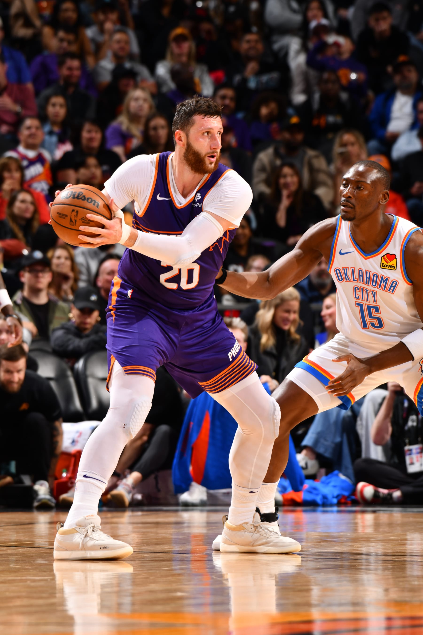 PHOENIX, AZ - MARCH 3: Jusuf Nurkic #20 of the Phoenix Suns handles the ball during the game against the Oklahoma City Thunder on March 3, 2024 at Footprint Center in Phoenix, Arizona. NOTE TO USER: User expressly acknowledges and agrees that, by downloading and or using this photograph, user is consenting to the terms and conditions of the Getty Images License Agreement. Mandatory Copyright Notice: Copyright 2024 NBAE (Photo by Barry Gossage/NBAE via Getty Images)