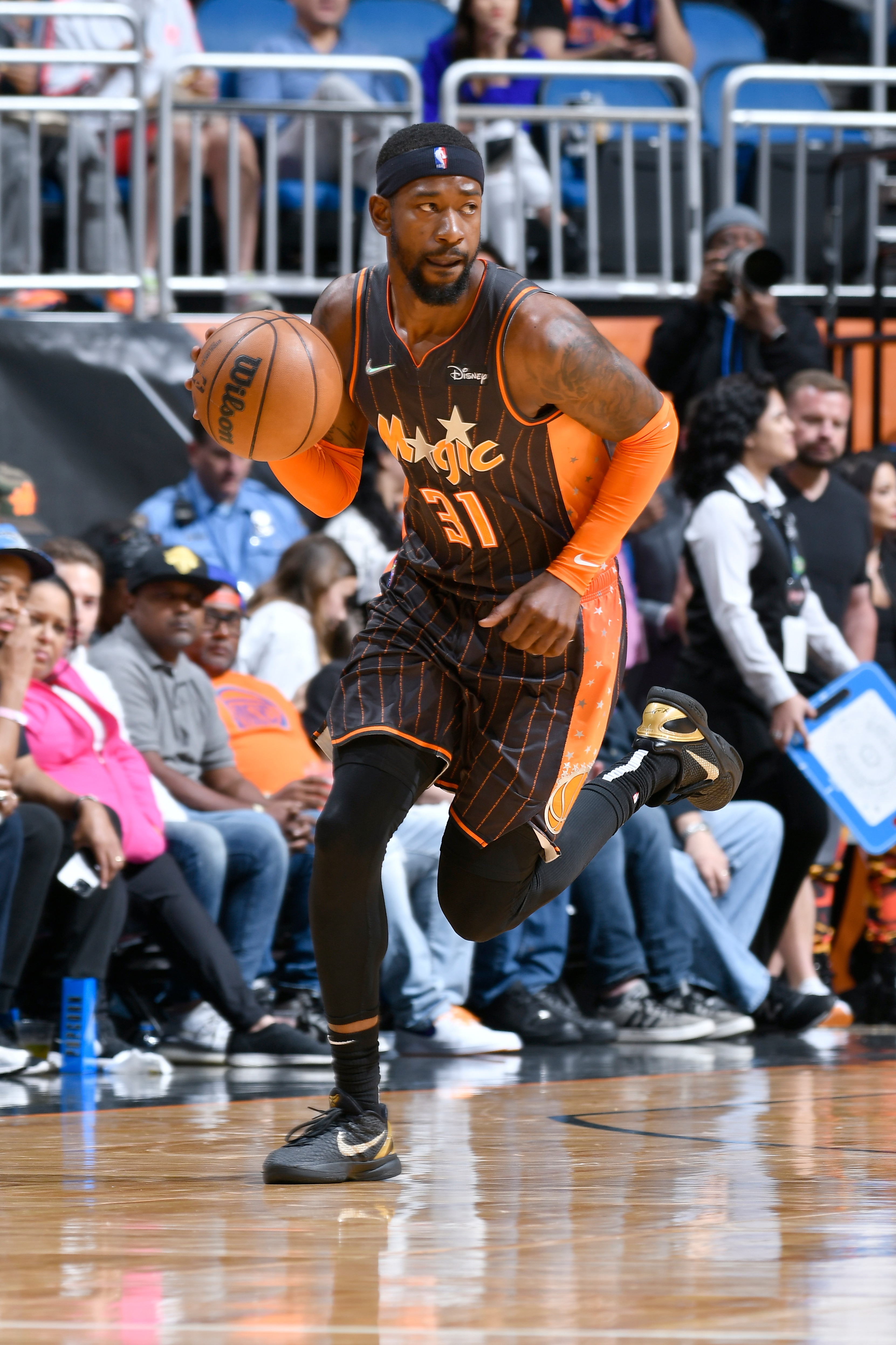 ORLANDO, FL - APRIL 3: Terrence Ross #31 of the Orlando Magic dribbles the ball during the game against the New York Knicks on April 3, 2022 at Amway Center in Orlando, Florida. NOTE TO USER: User expressly acknowledges and agrees that, by downloading and or using this photograph, User is consenting to the terms and conditions of the Getty Images License Agreement. Mandatory Copyright Notice: Copyright 2022 NBAE (Photo by Fernando Medina/NBAE via Getty Images)