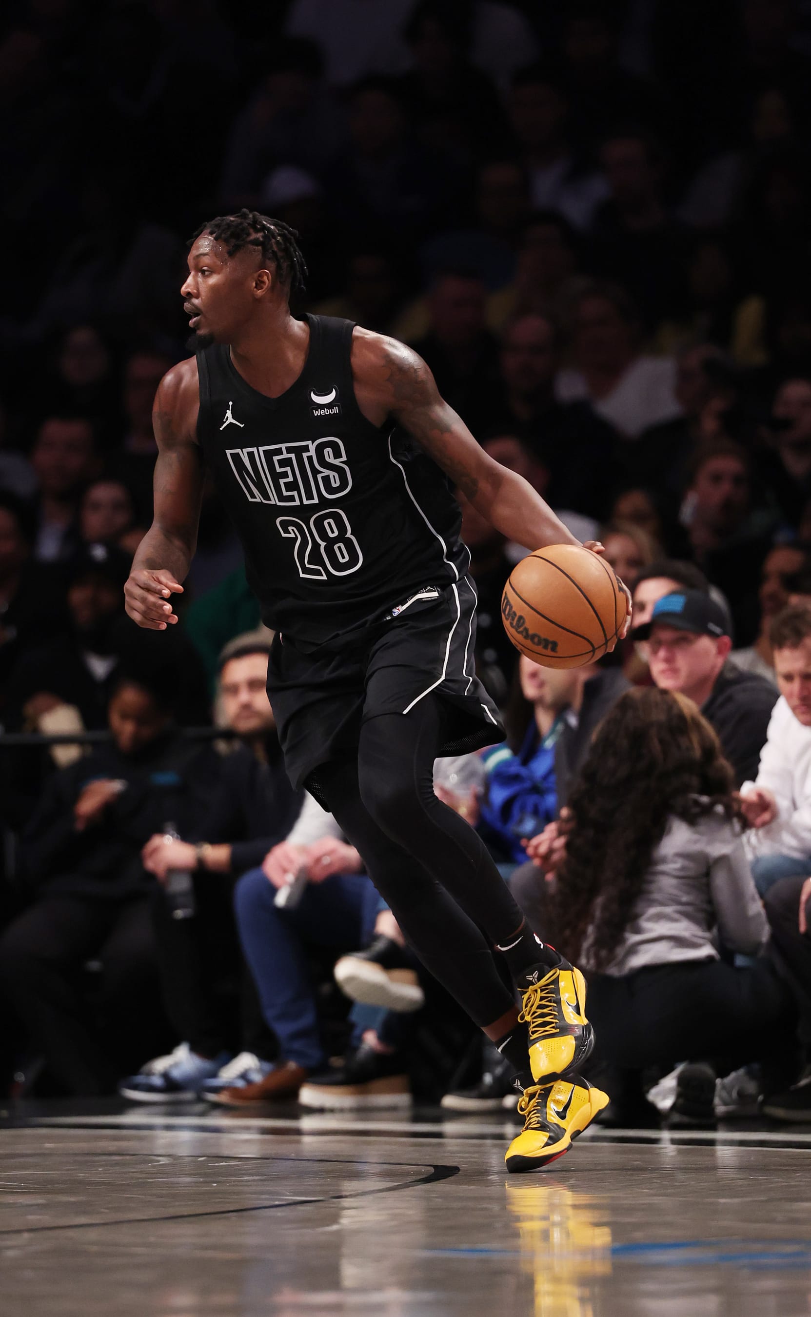 NEW YORK, NEW YORK - JANUARY 25:  Dorian Finney-Smith #28 of the Brooklyn Nets in action against the Minnesota Timberwolves during their game at Barclays Center on January 25, 2024 in New York City.  User expressly acknowledges and agrees that, by downloading and or using this photograph, User is consenting to the terms and conditions of the Getty Images License Agreement.  (Photo by Al Bello/Getty Images)