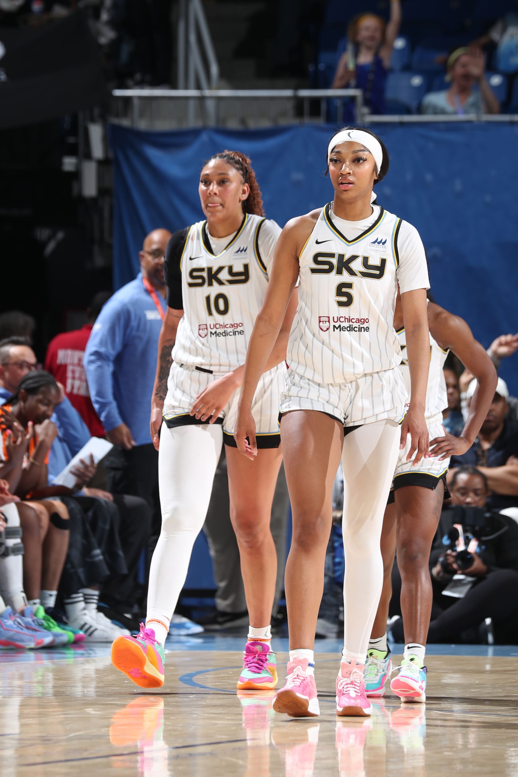CHICAGO, IL -  JUNE 8: Angel Reese #5 and Kamilla Cardoso #10 of the Chicago Sky look on during the game against the Atlanta Dream during the 2024 Commissioner's Cup on June 8, 2024 at the Wintrust Arena in Chicago, IL. NOTE TO USER: User expressly acknowledges and agrees that, by downloading and or using this photograph, User is consenting to the terms and conditions of the Getty Images License Agreement. Mandatory Copyright Notice: Copyright 2024 NBAE (Photo by Gary Dineen/NBAE via Getty Images)