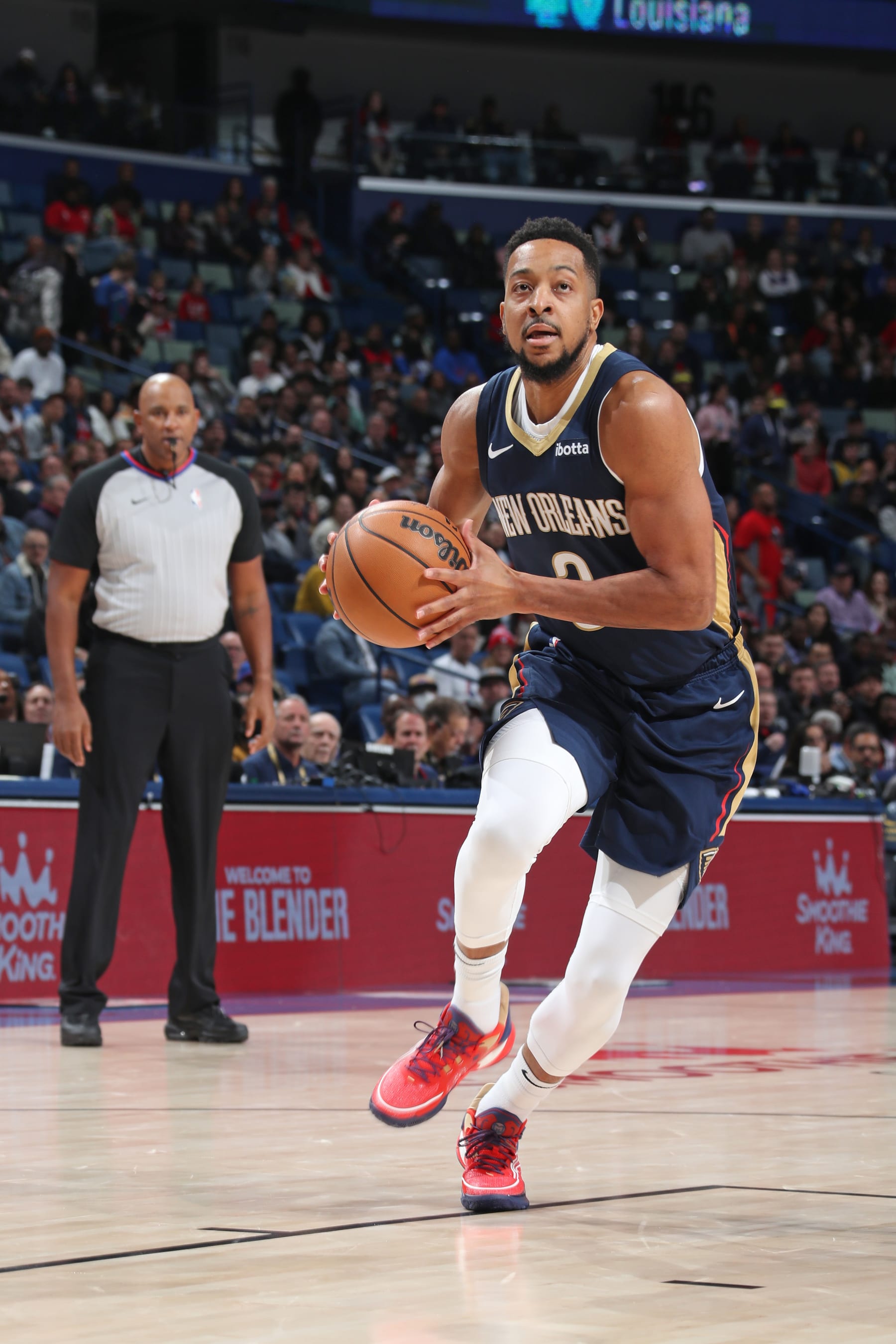 NEW ORLEANS, LA - NOVEMBER 29: CJ McCollum #3 of the New Orleans Pelicans drives to the basket during the game against the Philadelphia 76ers on November 29, 2023 at the Smoothie King Center in New Orleans, Louisiana. NOTE TO USER: User expressly acknowledges and agrees that, by downloading and or using this Photograph, user is consenting to the terms and conditions of the Getty Images License Agreement. Mandatory Copyright Notice: Copyright 2023 NBAE (Photo by Layne Murdoch Jr./NBAE via Getty Images)