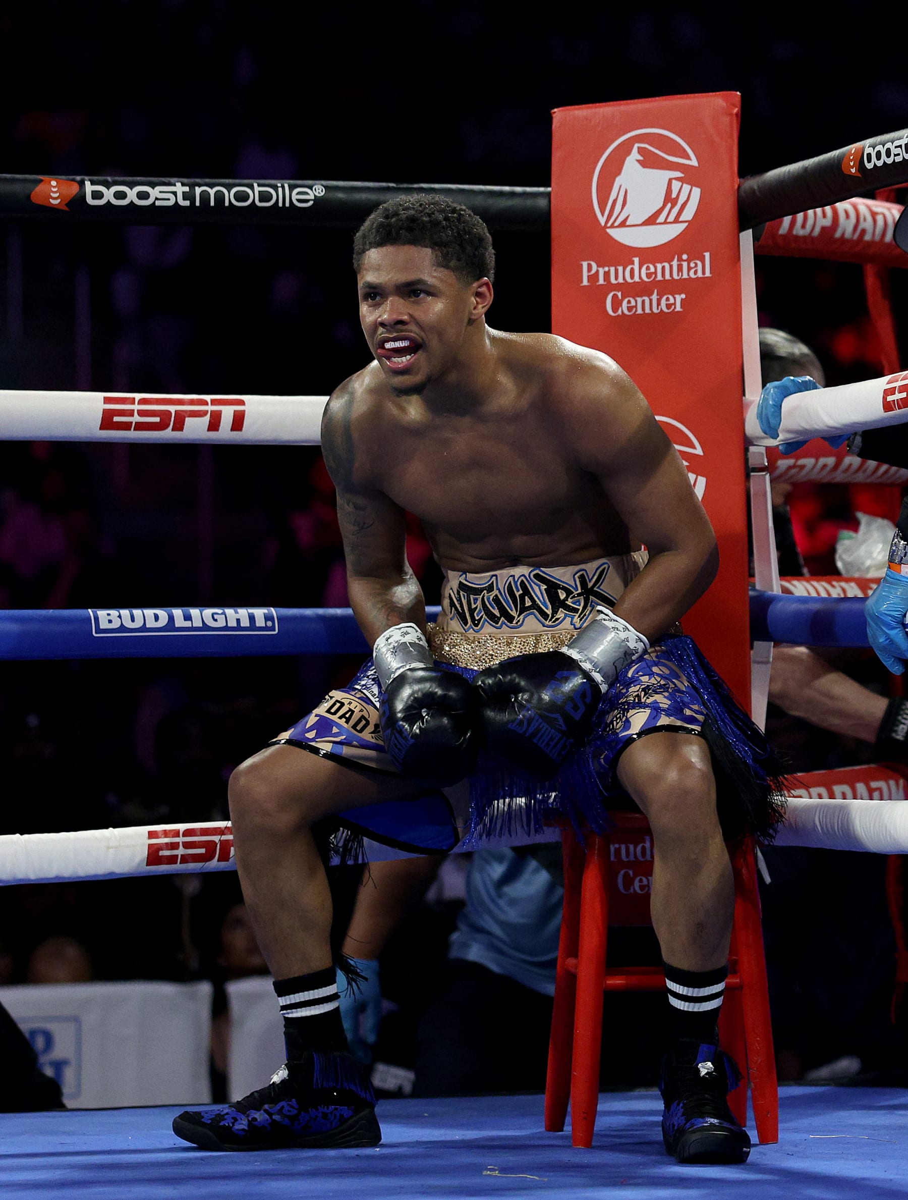 NEWARK, NEW JERSEY - APRIL 08: Shakur Stevenson of the United States smiles as he sits in his corner after the fourth round against Shuichiro Yoshino of Japan during their WBC Lightweight Final Eliminator match at Prudential Center on April 08, 2023 in Newark, New Jersey. (Photo by Elsa/Getty Images)