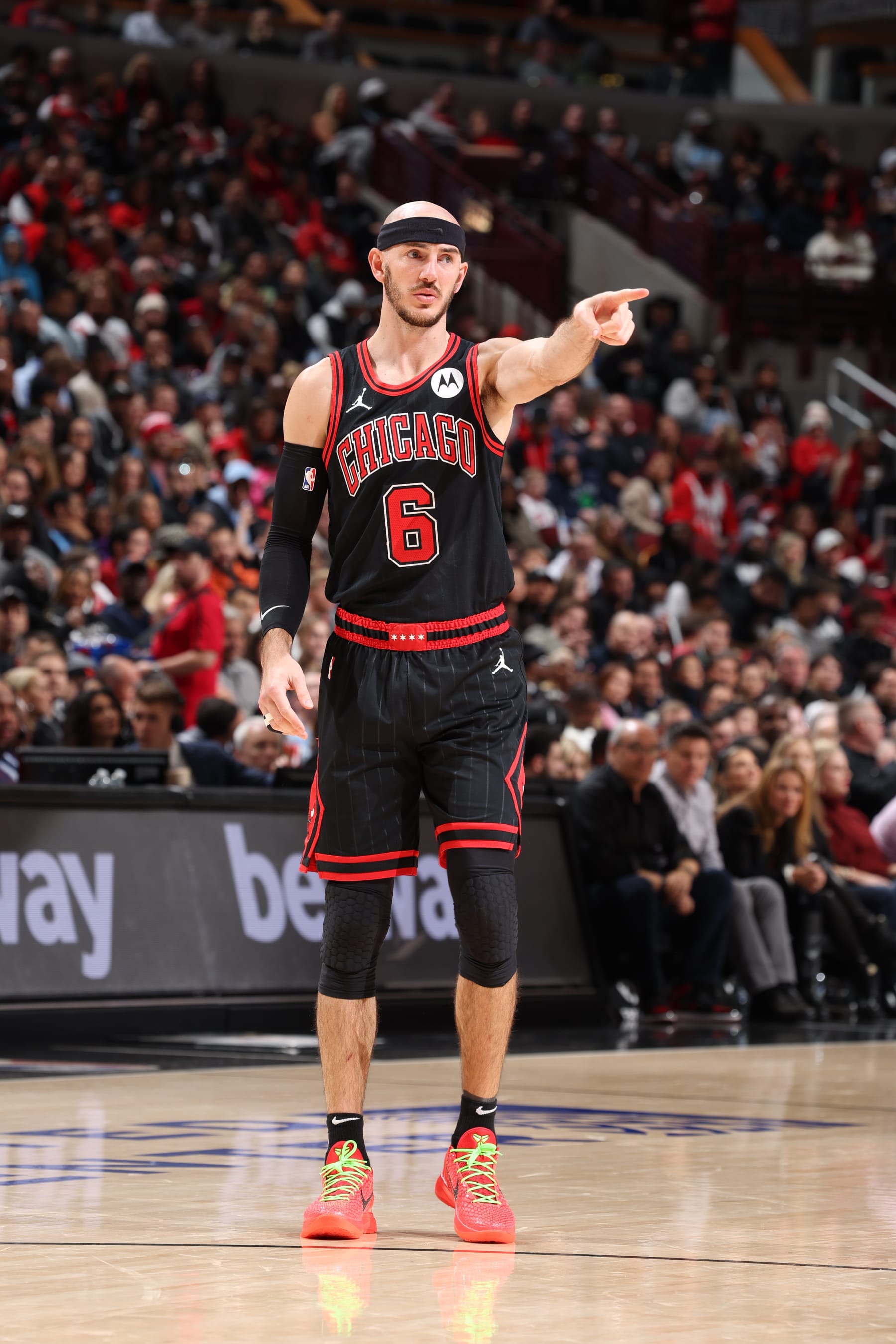 CHICAGO, IL - NOVEMBER 18: Alex Caruso #6 of the Chicago Bulls points during the game against the Miami Heat on November 18, 2023 at United Center in Chicago, Illinois. NOTE TO USER: User expressly acknowledges and agrees that, by downloading and or using this photograph, User is consenting to the terms and conditions of the Getty Images License Agreement. Mandatory Copyright Notice: Copyright 2023 NBAE (Photo by Jeff Haynes/NBAE via Getty Images)